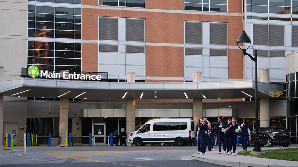 Workers exit Wilmington Hospital after a shooting, Delaware, US, June 16, 2026. /VCG