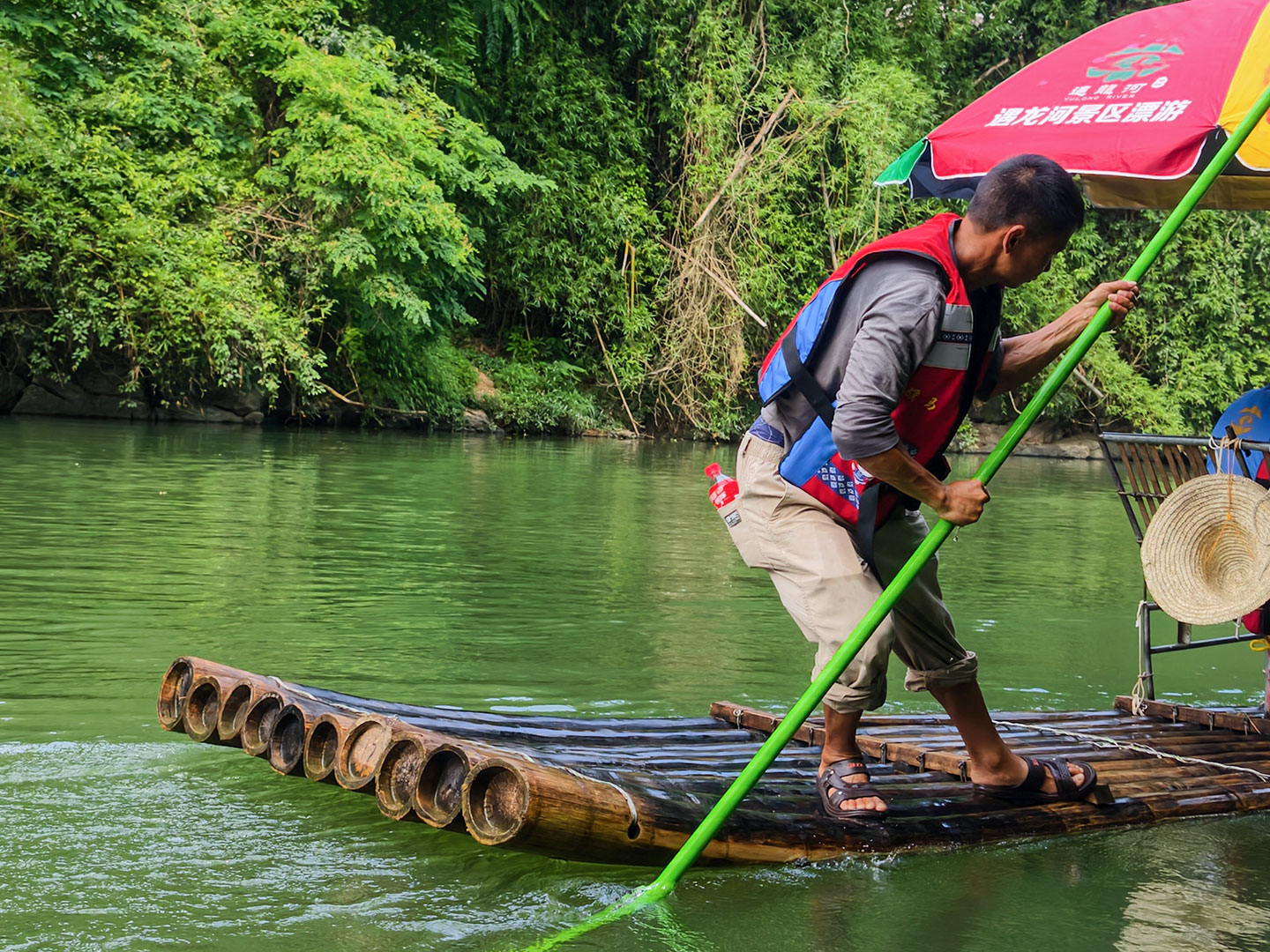 A photo taken on June 2, 2026 shows a view from a bamboo raft floating down the Yulong River in Yangshuo, Guangxi. /CGTN