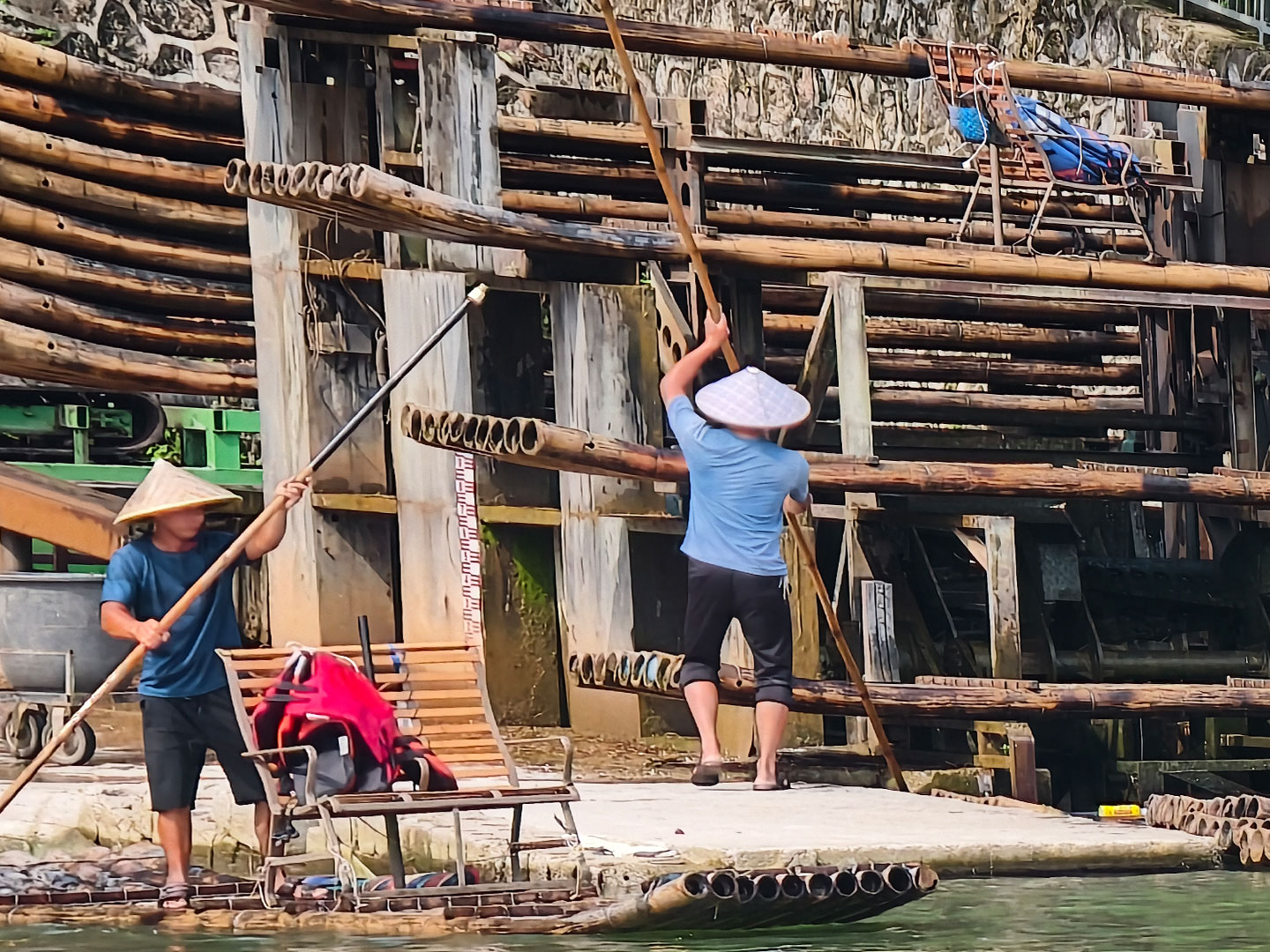 A photo taken on June 2, 2026 shows a view of the dock on the Yulong River in Yangshuo, Guangxi, where bamboo rafts are unloaded and moored. /CGTN