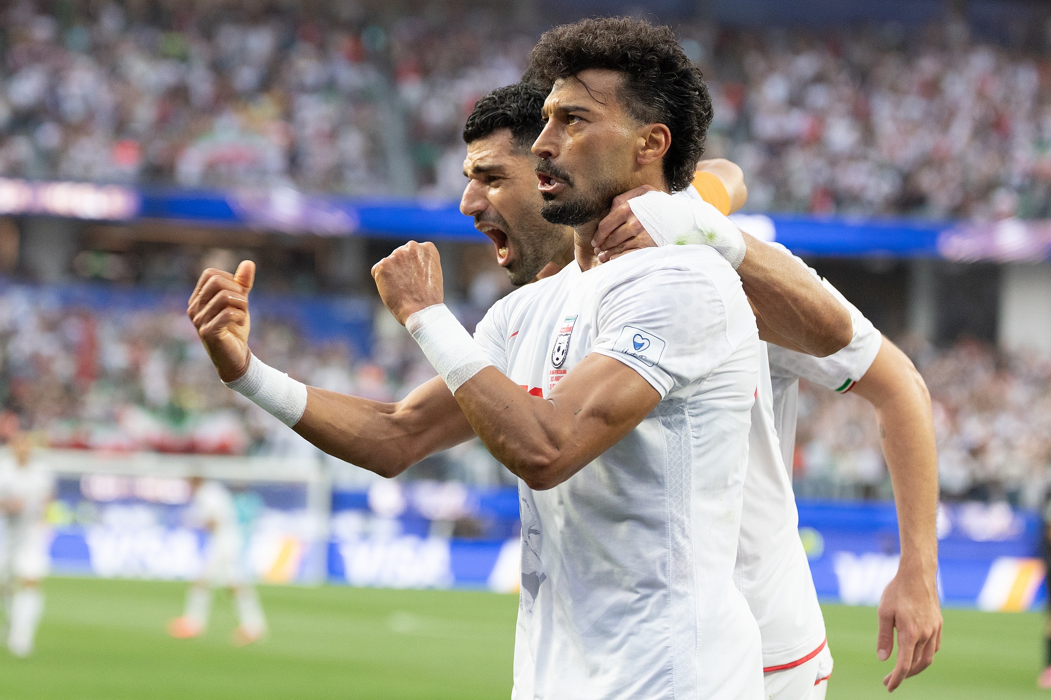 Iran players celebrate after scoring a goal in the Group G match against New Zealand at the 2026 FIFA World Cup in Los Angeles, California, June 15, 2026. /VCG