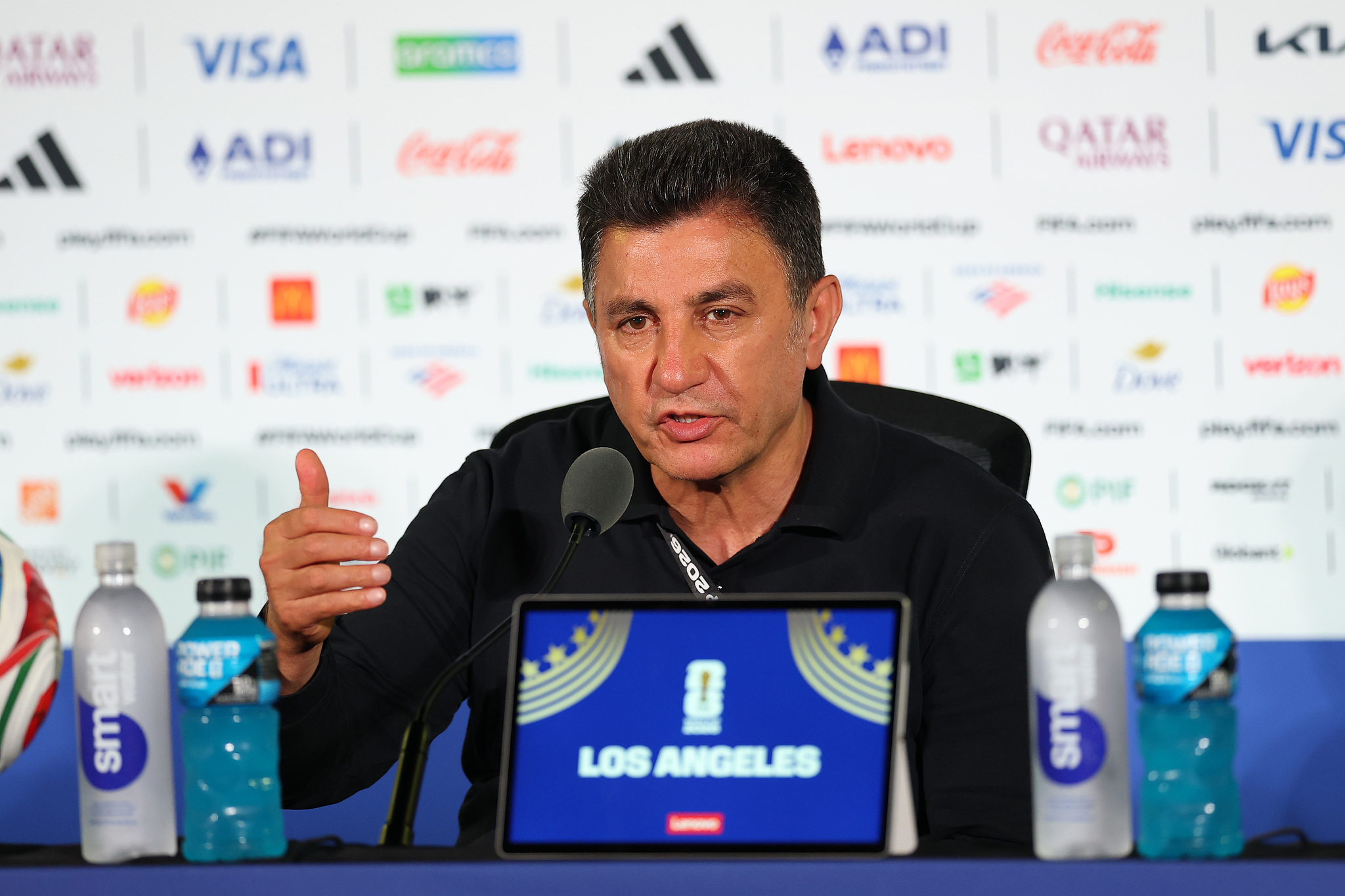 Iran head coach Amir Ghalenoei speaks at a post-match press conference after his team's 2-2 draw with New Zealand in Group G at the 2026 FIFA World Cup in Los Angeles, California, June 15, 2026. /VCG