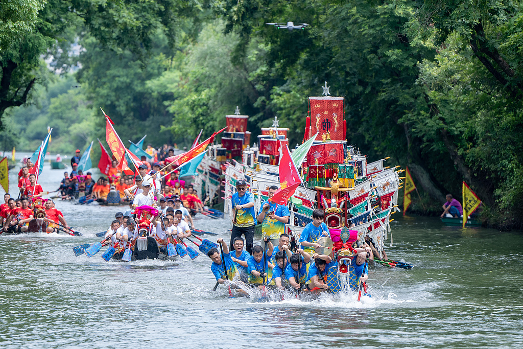 The dragon boat race gets underway at Xixi National Wetland Park in Hangzhou, east China's Zhejiang Province, June 19, 2026. /VCG