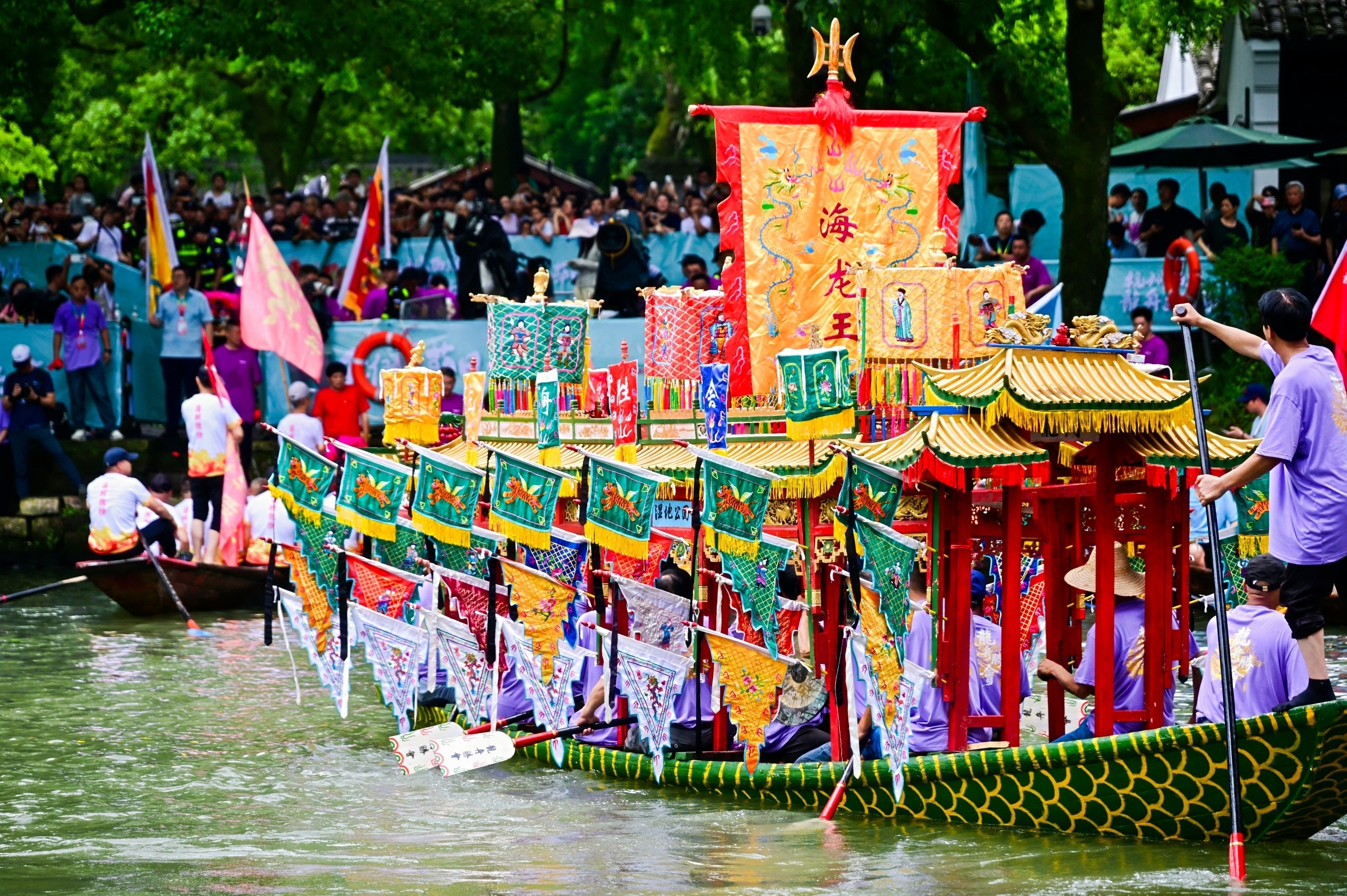 A traditional dragon boat rests on the shimmering waters of Xixi Wetland in Hangzhou, east China's Zhejiang Province, June 19, 2026. /Courtesy of CICAF