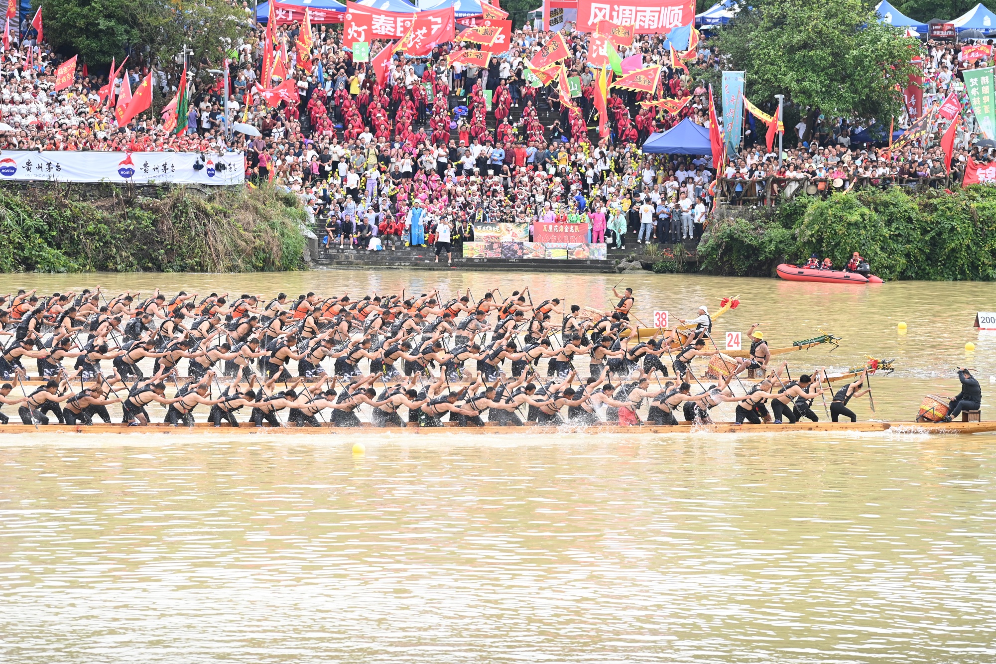 A dragon boat race is held in Tongren City, southwest China's Guizhou Province on June 19, 2026. /Tongren Media Convergence Center