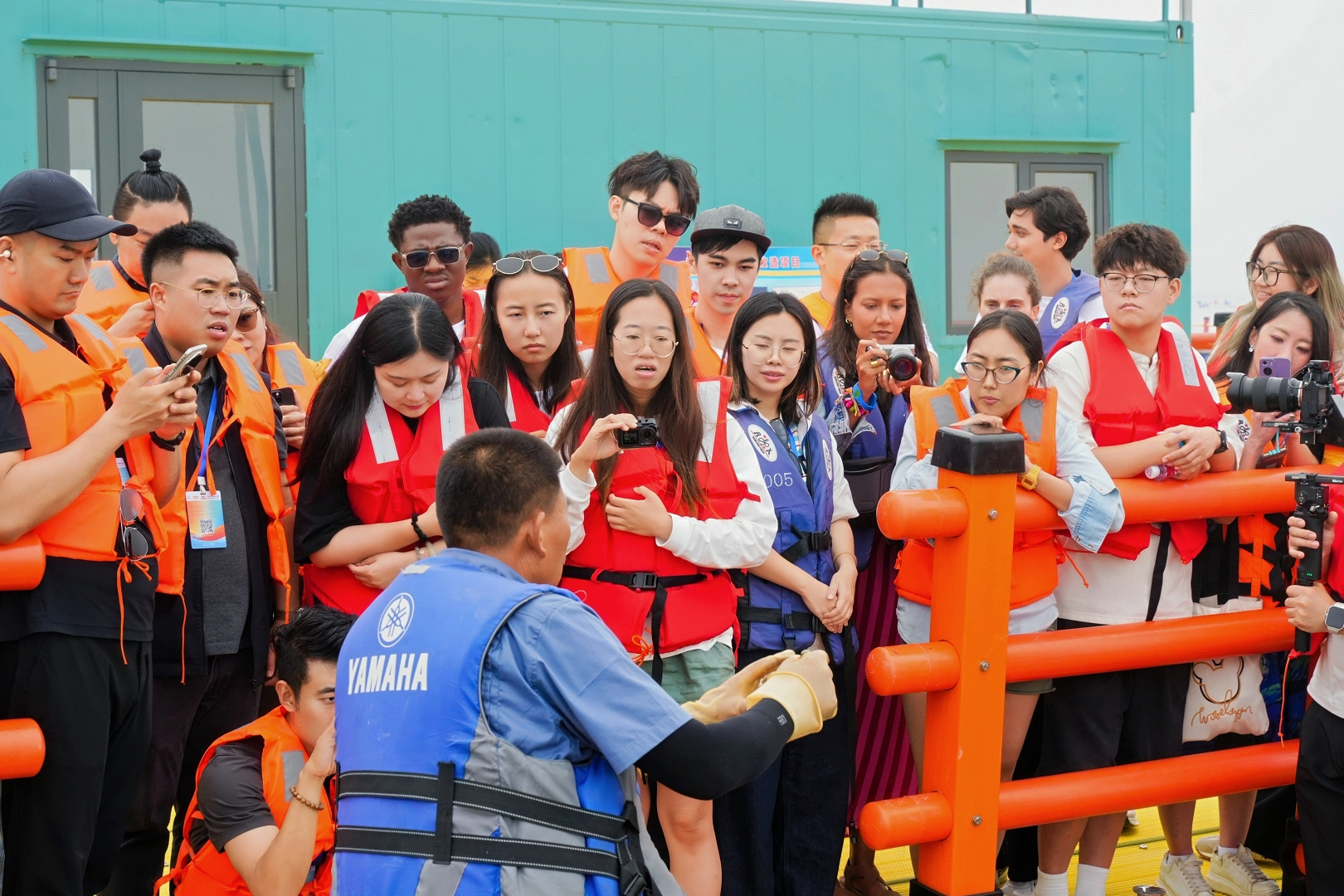 Global shapers tour a local seafood enterprise in Dalian, June 19, 2026. /GSC Dalian hub