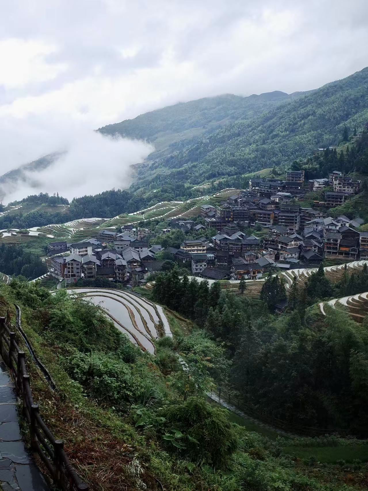 Traditional wooden architecture remains at the heart of local life in Longji Village, Guangxi. /CGTN