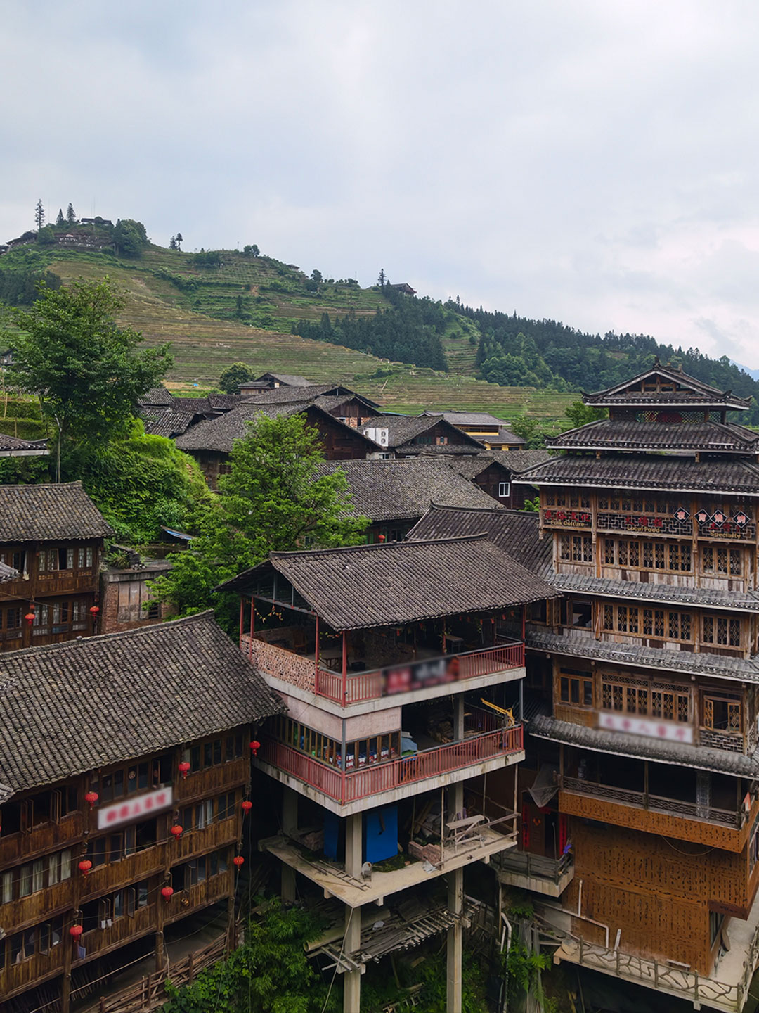 Wooden houses and terraced fields in Longji Village, Guangxi, have shaped the landscape for generations. /CGTN