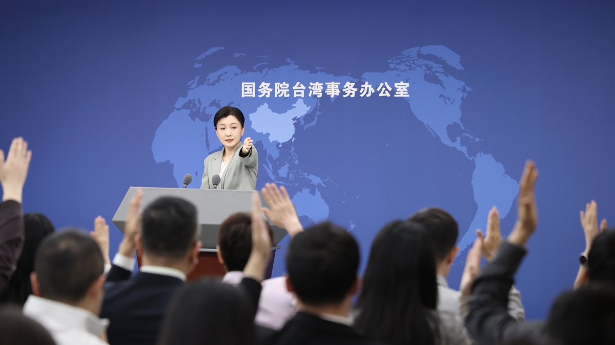 File photo of Zhang Han, spokesperson for the State Council Taiwan Affairs Office, holding a regular press conference in Beijing, China. /VCG