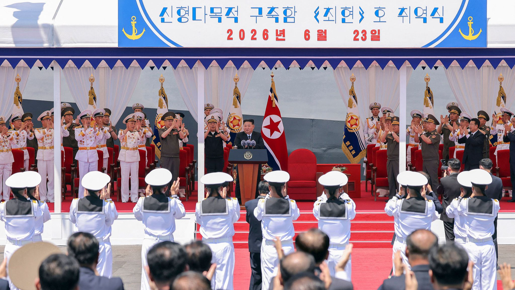 Kim Jong Un, top leader of the Democratic People's Republic of Korea (DPRK), attends a commissioning ceremony of its new-type multi-mission destroyer Choe Hyon at Nampho Port, DPRK, June 23, 2026. /VCG