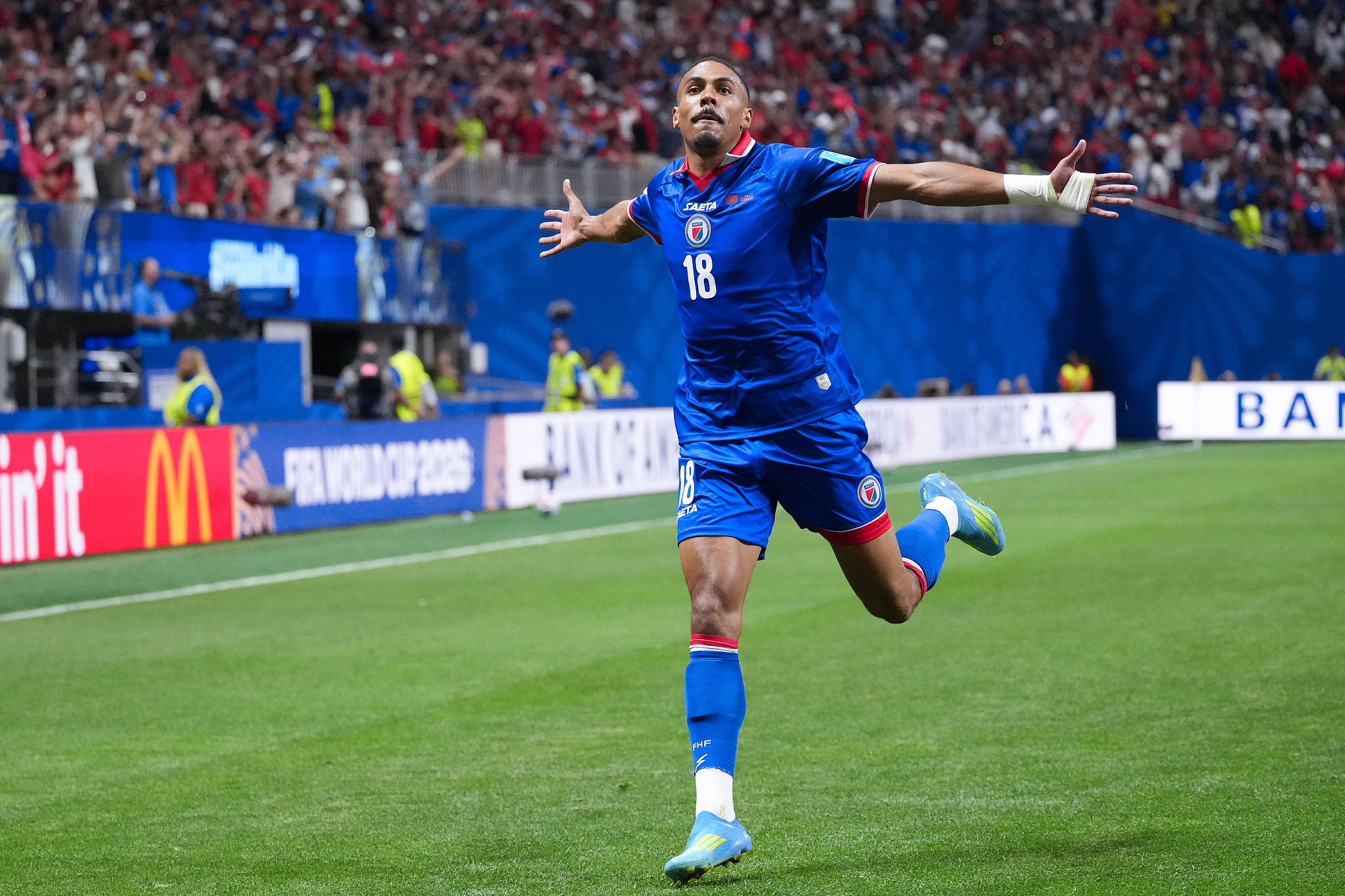 Haiti midfielder Wilson Isidor (#18) celebrates after scoring a goal against Morocco in a Group C match at the 2026 FIFA World Cup in Atlanta, Georgia, June 24, 2026. /VCG