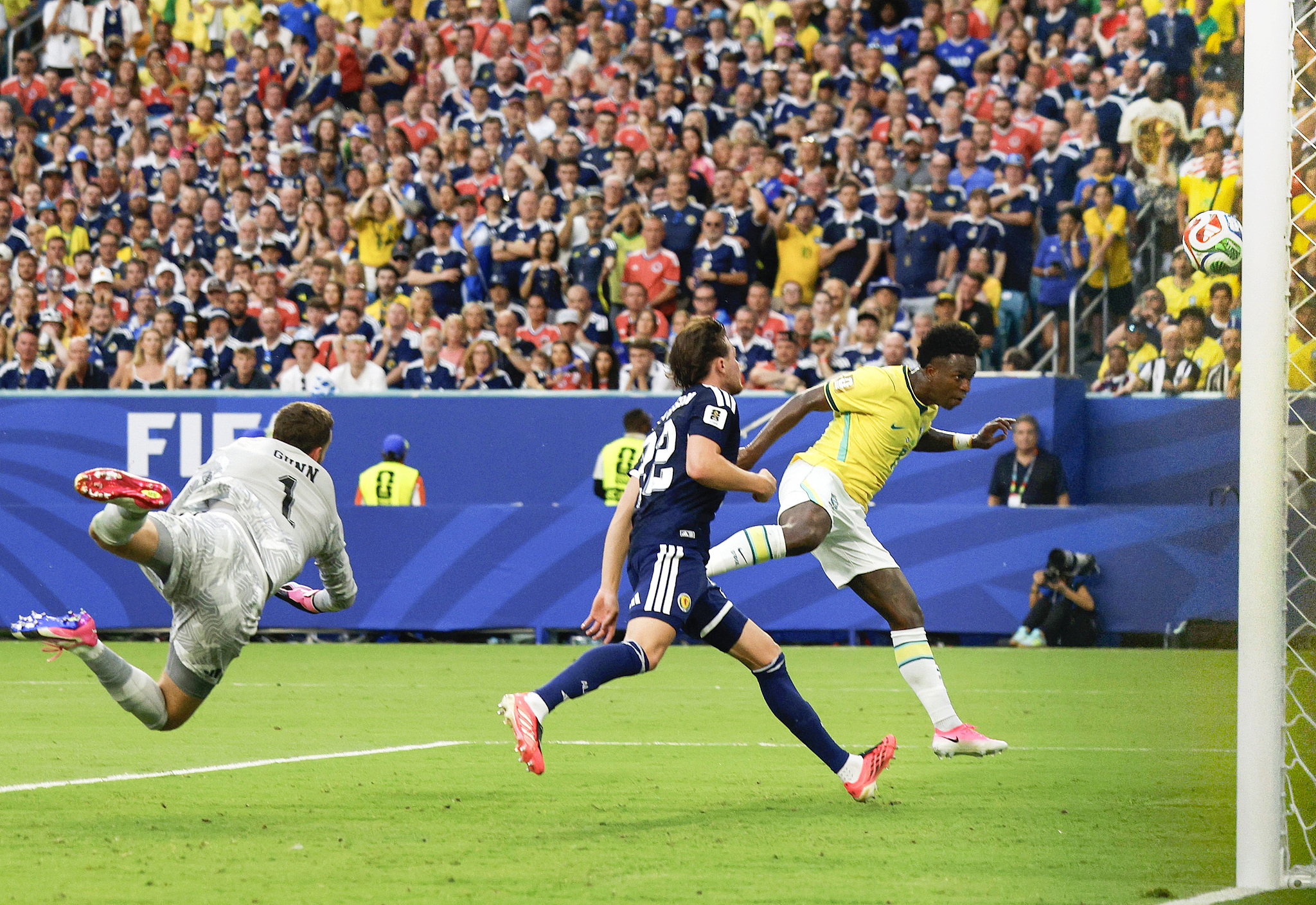 Brazil striker Vinicius Junior (R) scores a goal against Scotland in a Group C match at the 2026 FIFA World Cup in Miami Gardens, Florida, June 24, 2026. /VCG