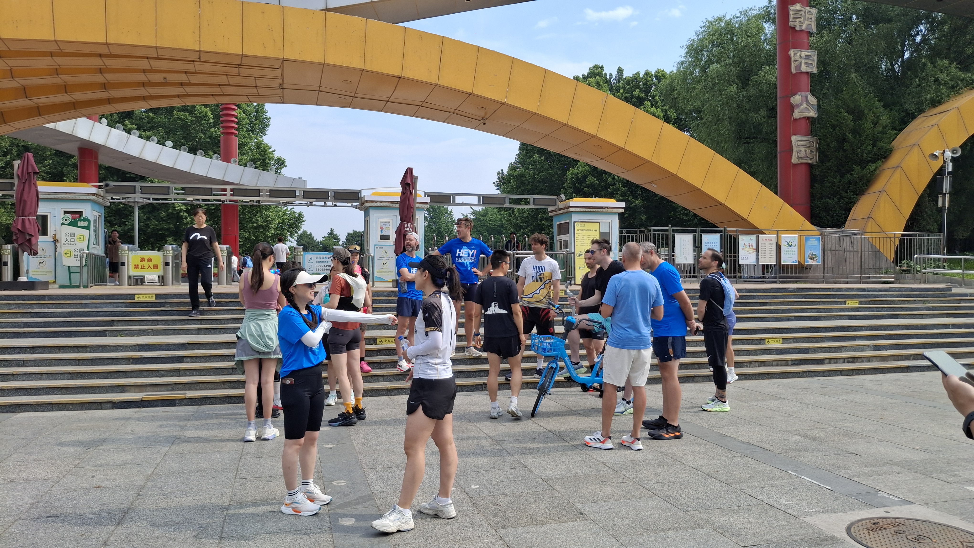 Runners meet outside a park in Beijing before a weekend group run. Across China, running clubs are becoming spaces where friendships and community are built alongside fitness, June 2026. /Denique Daniëls