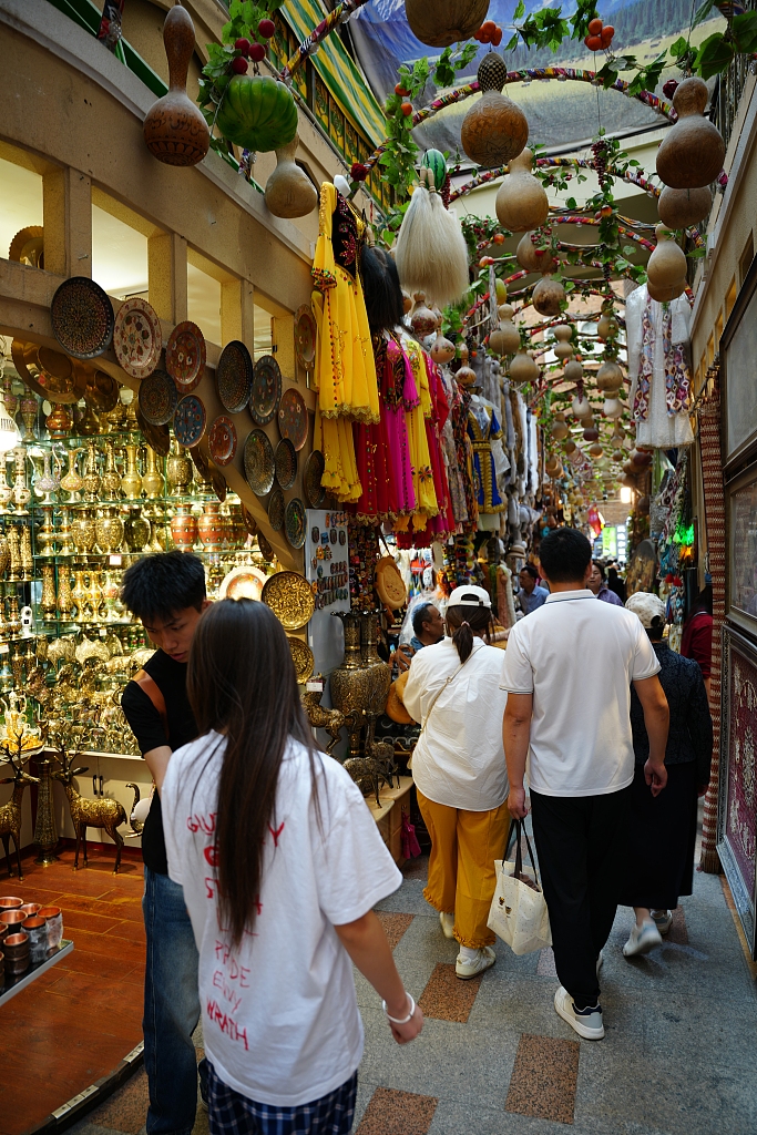 A row of shops is seen at the Xinjiang International Grand Bazaar in Urumqi on May 2, 2026. /VCG
