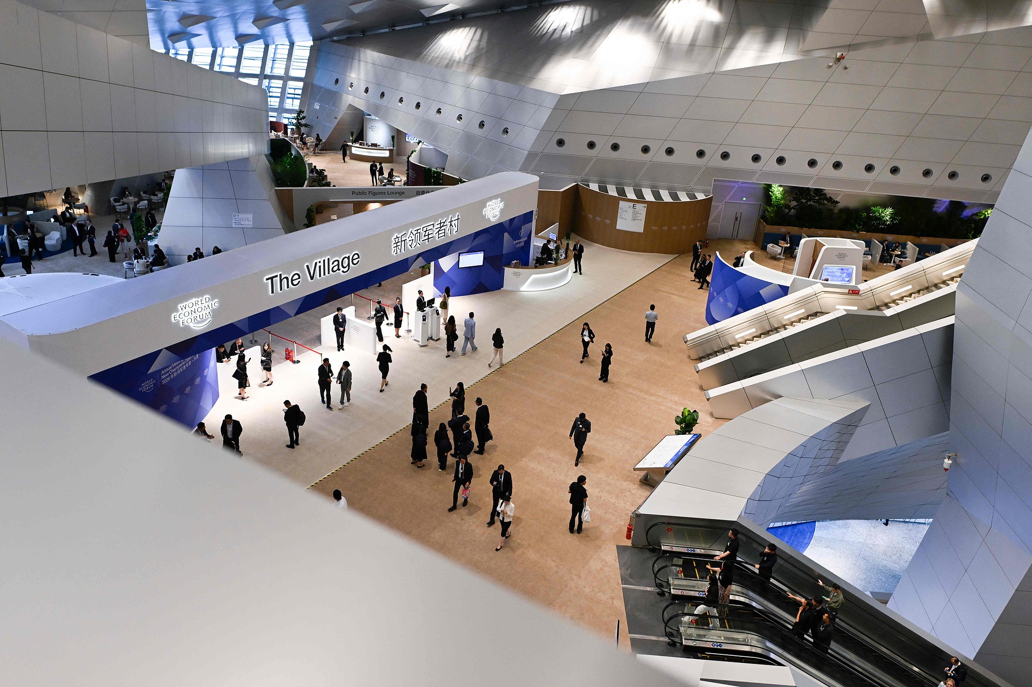 Attendees at the Dalian International Conference Centre during the World Economic Forum Annual Meeting of the New Champions 2026 in Dalian, China's Liaoning province, June 23, 2026. /VCG