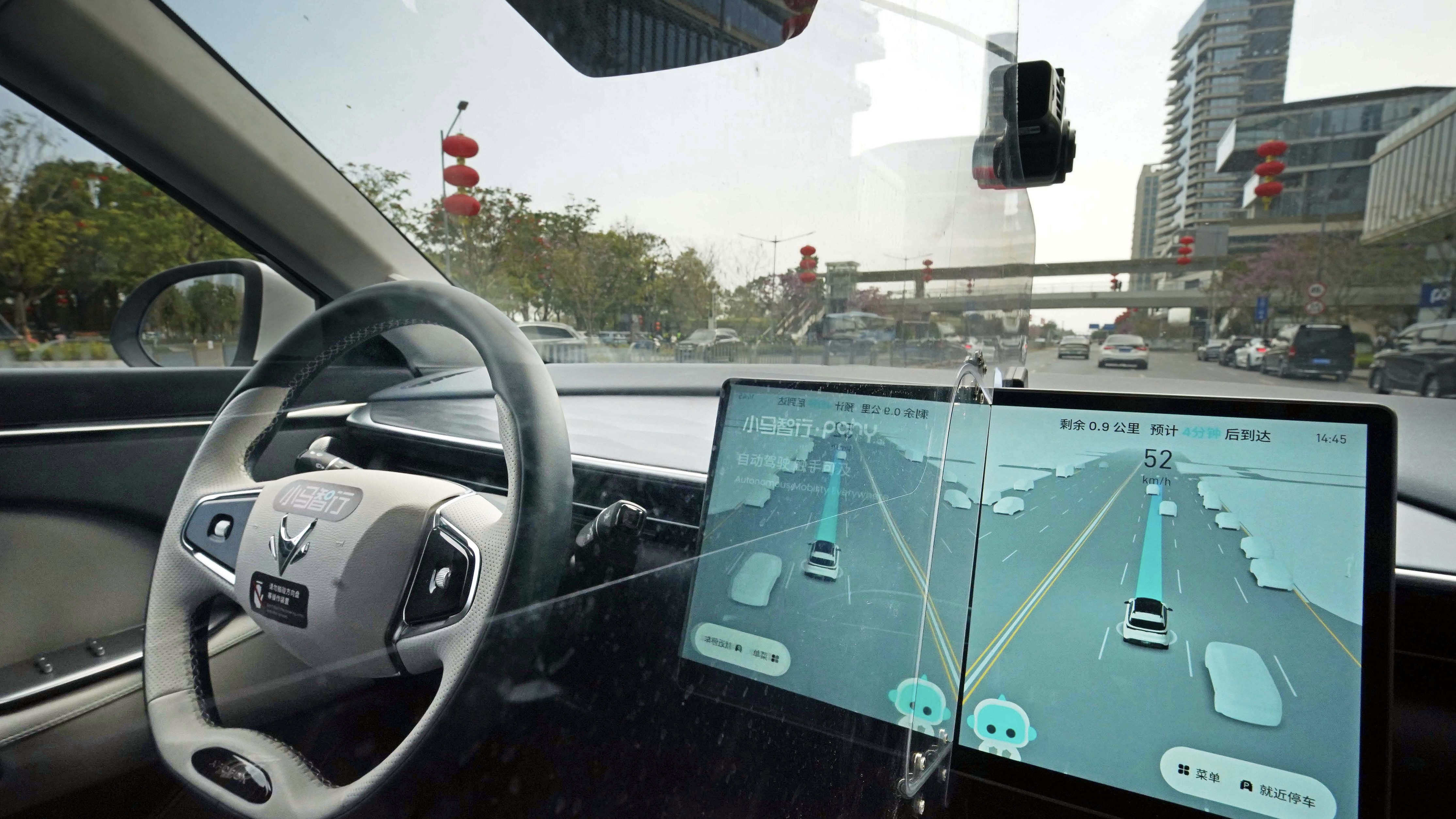 A PONY AI Inc. Robotaxi operates without a driver behind the wheel in Shenzhen, Guangdong Province, China, February 12, 2026. /VCG