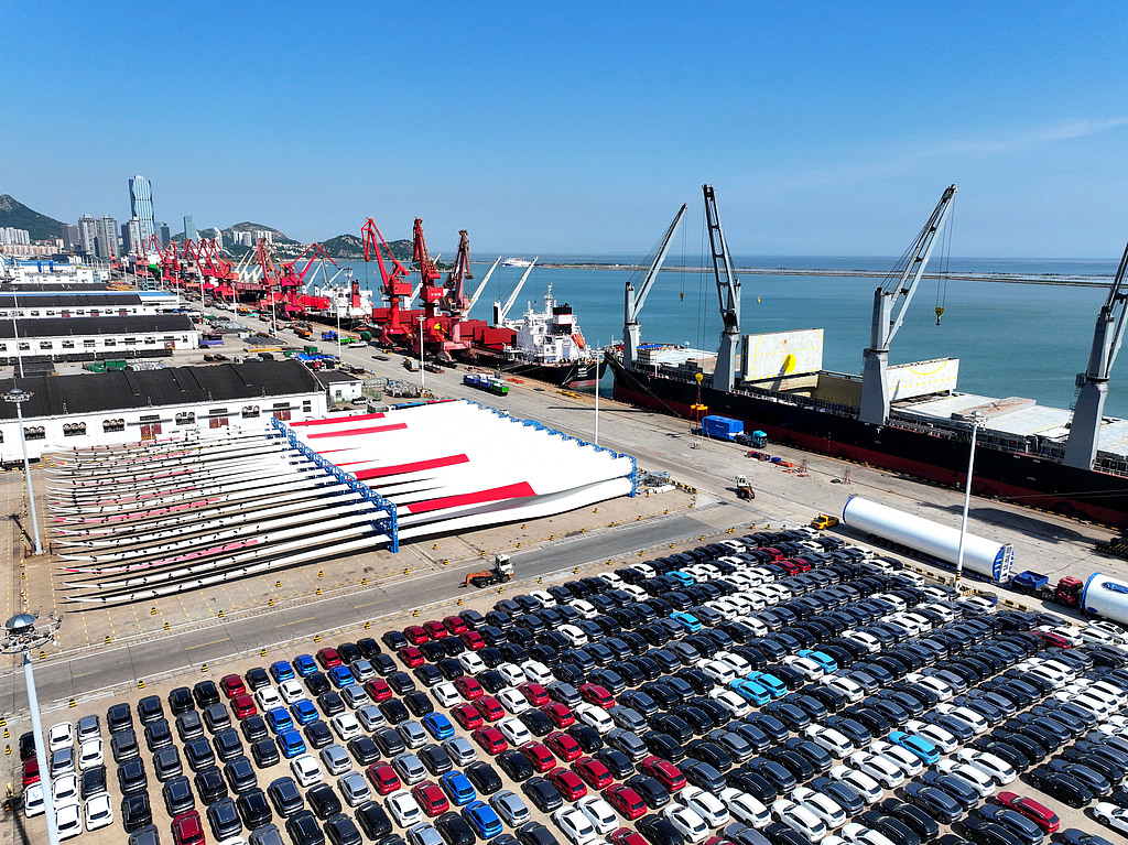 Automobiles and wind power equipment await shipment at a terminal of the Port of Lianyungang in east China's Jiangsu Province, May 31, 2026. /CFP
