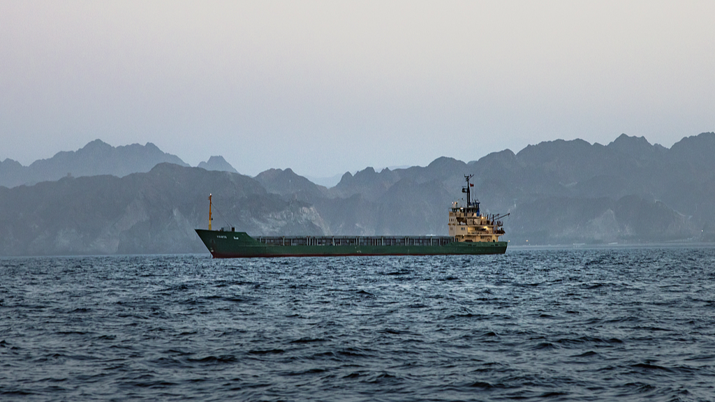 A cargo vessel is anchored off the coast of Oman after being stranded for days, June 23, 2026. /VCG