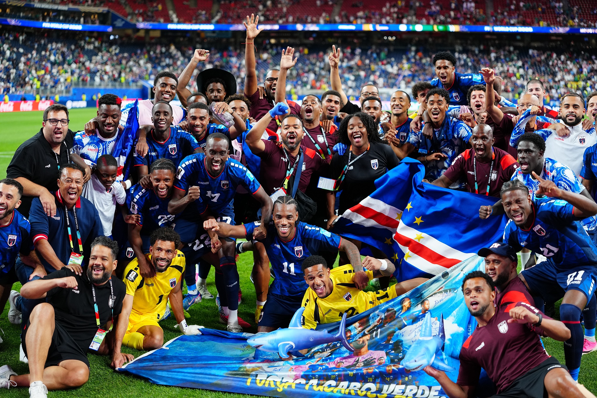 Cabo Verde's players celebrate after earning a draw against Saudi Arabia to advance to the round of 32 following their Group H match at the 2026 FIFA World Cup in Houston, Texas, June 26, 2026. /VCG