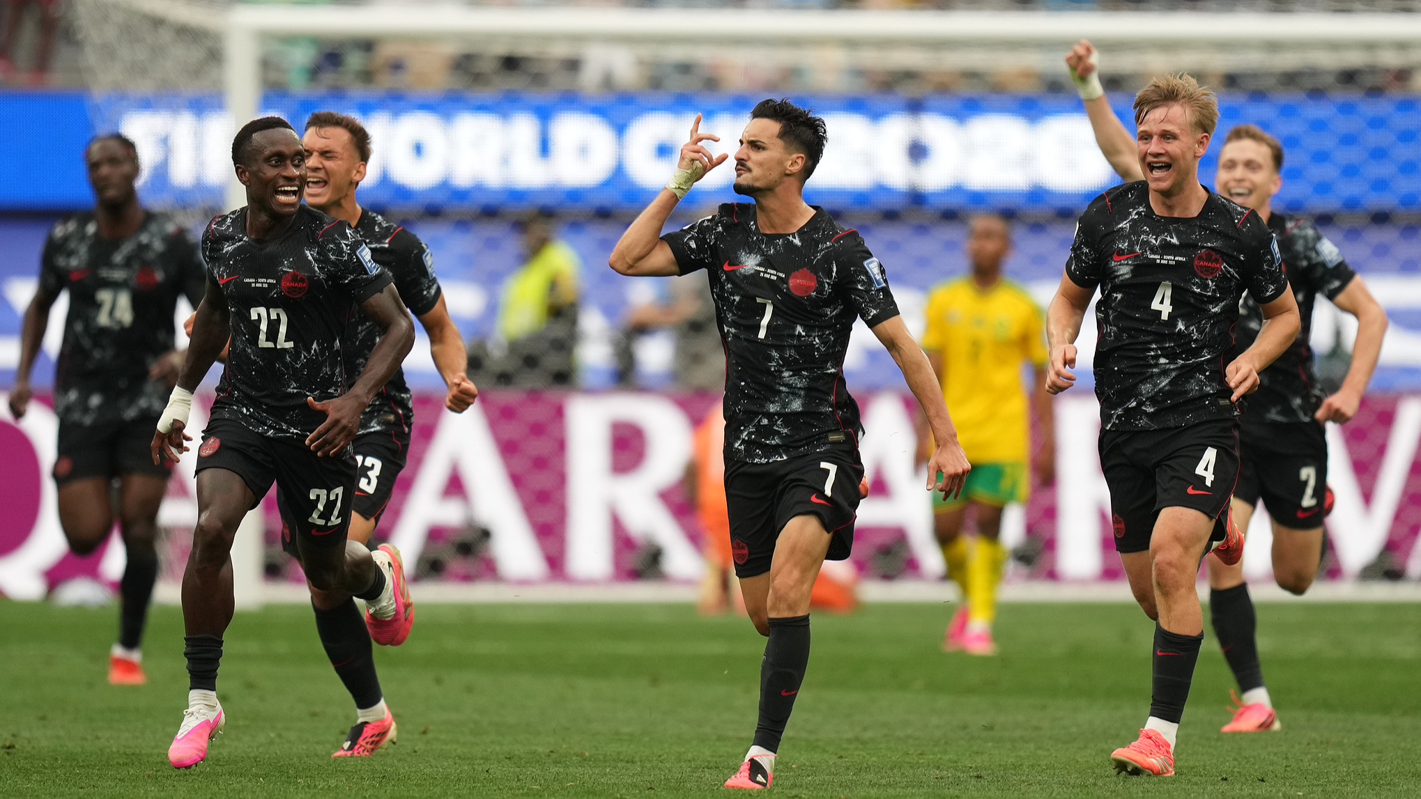Co-host Canada defeats South Africa to reach round of 16 at World Cup