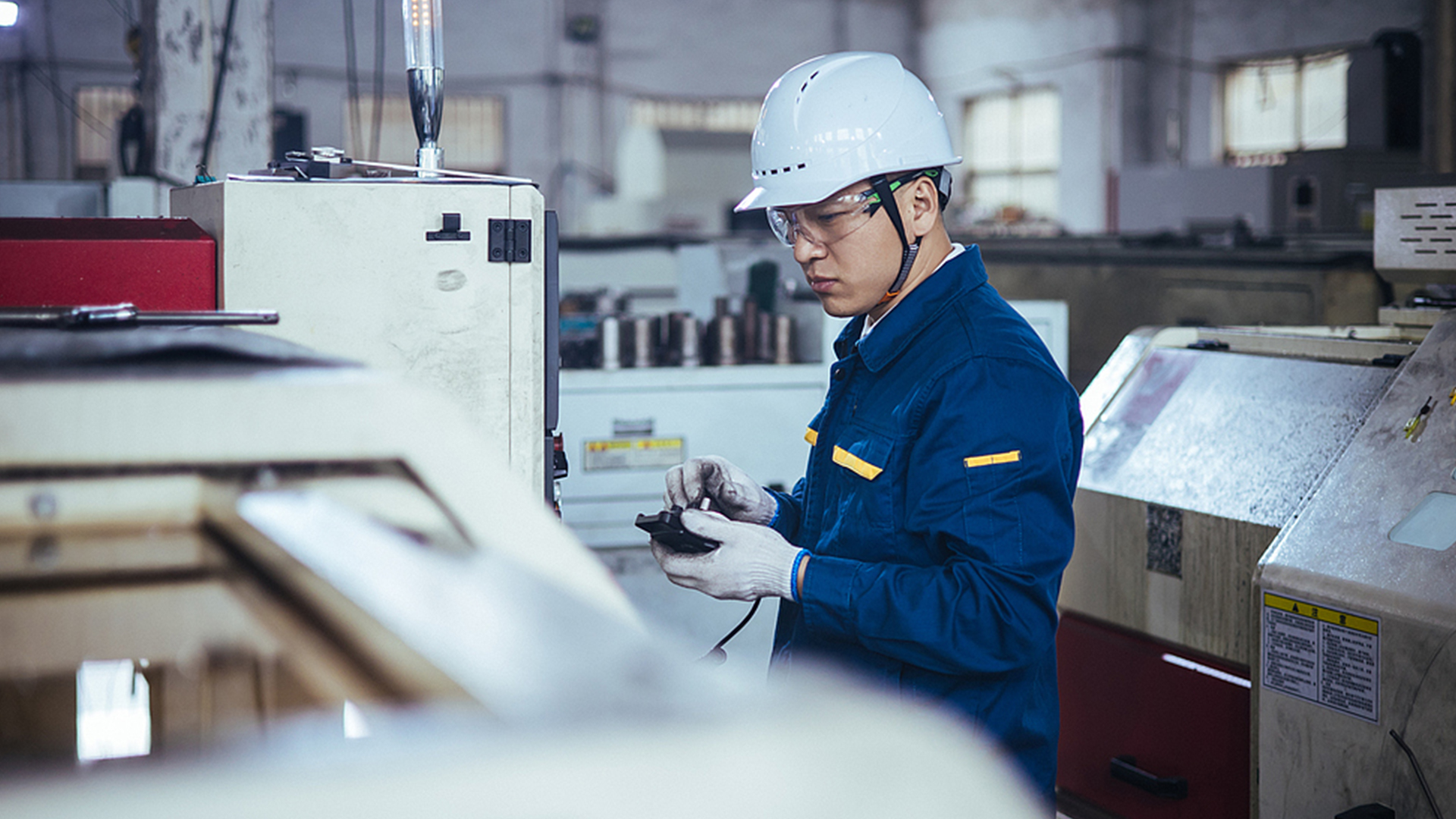 File: An engineer monitors machine operations. /VCG