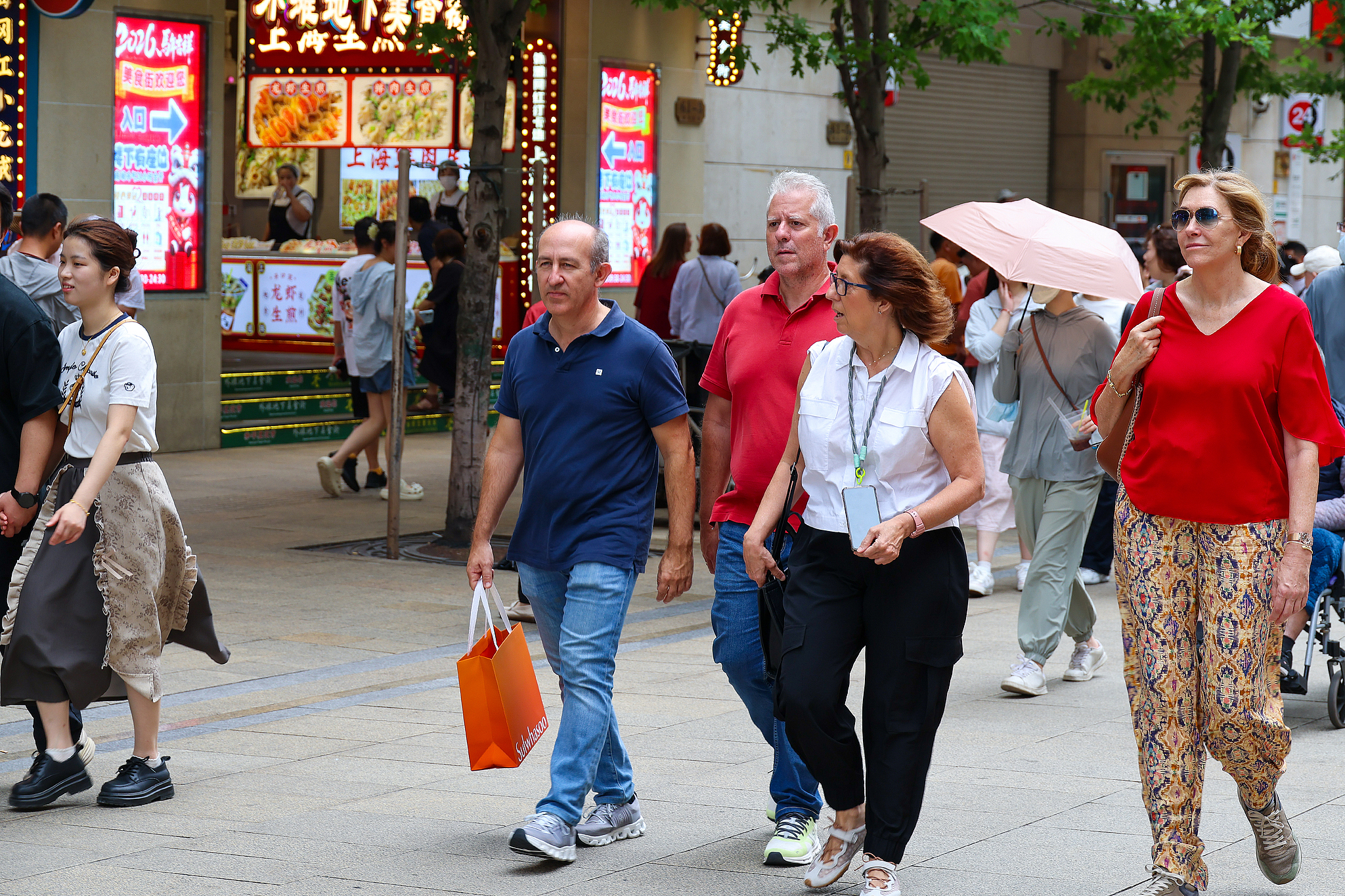 International tourists visit the Bund in Shanghai, China, June 27, 2026. /VCG