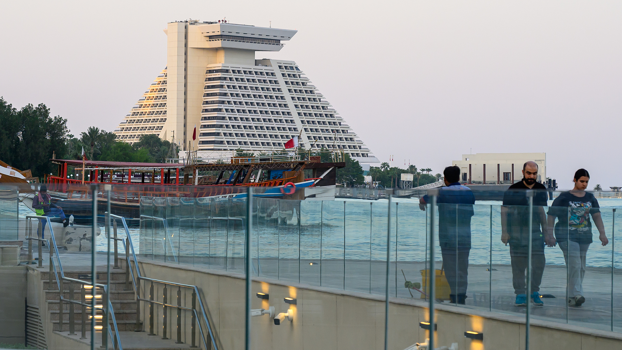 People walk along the Corniche area in Doha, Qatar, on June 29, 2026. /VCG