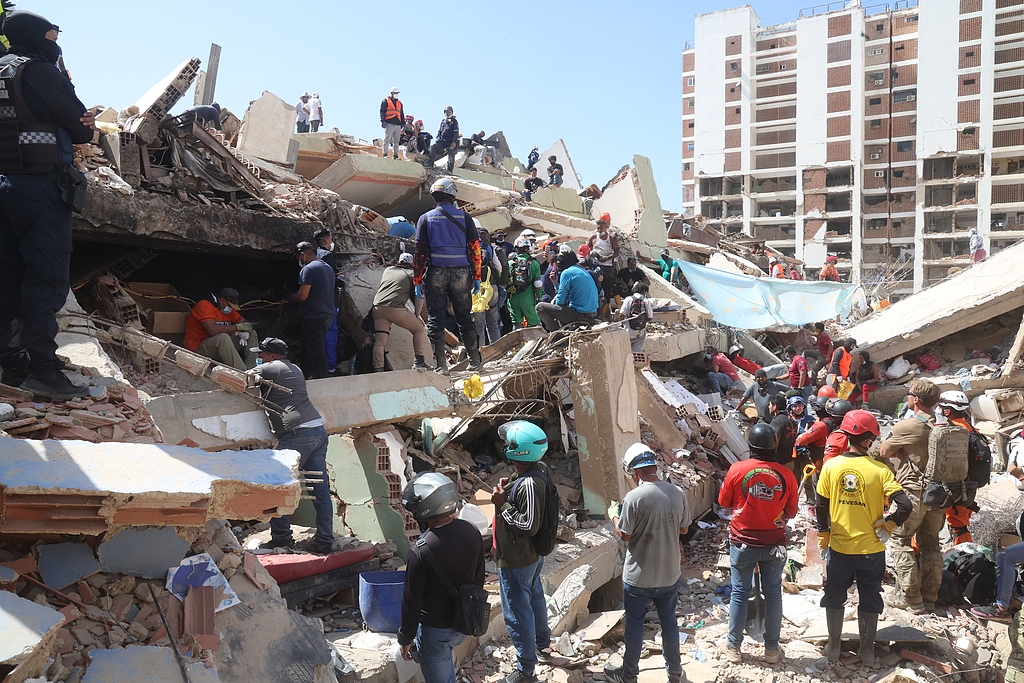 Work continues to remove the debris as part of search and rescue efforts at the collapsed residential building Rita in the San Bernardino neighborhood in Caracas, Venezuela, June 29, 2026. /VCG 