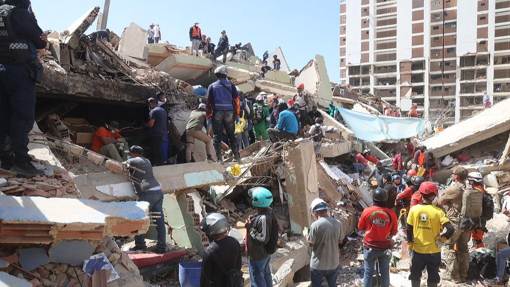 Venezuela quake death toll rises to 1,719 nearly a week on