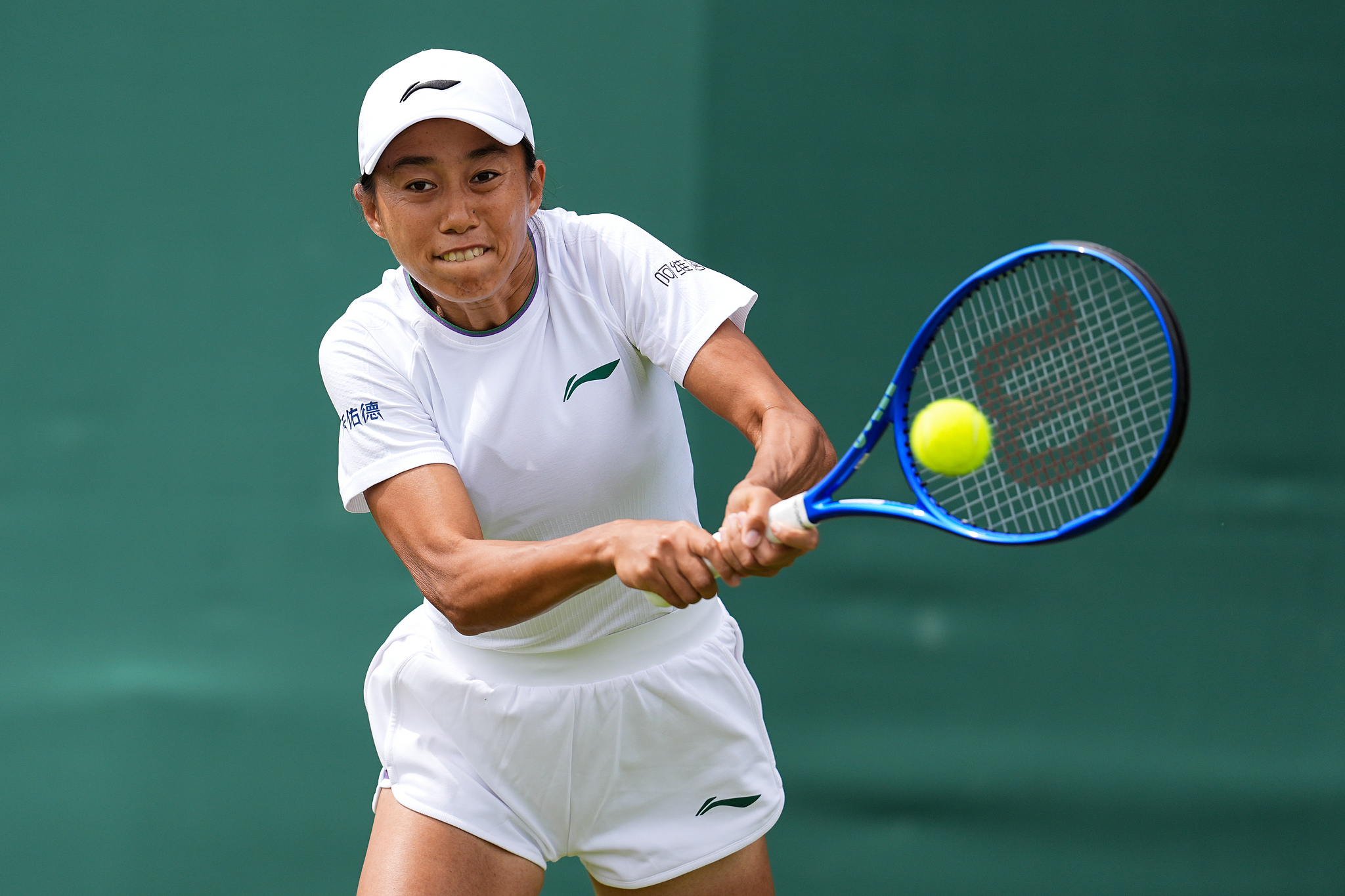 China's Zhang Shuai hits a shot in the women's singles first-round match against Canada's Bianca Andreescu at the Wimbledon Championships at All England Lawn Tennis and Croquet Club in London, England, June 29, 2026. /VCG