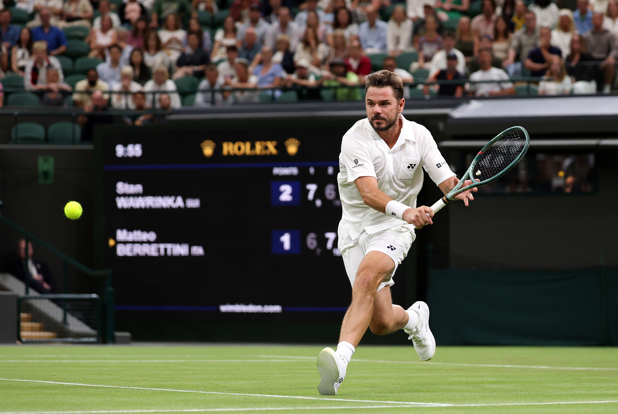 Switzerland's Stan Wawrinka hits a shot in the men's singles first-round match against Italy's Matteo Berrettini at the Wimbledon Championships at the All England Lawn Tennis and Croquet Club in London, England, June 30, 2026. /VCG