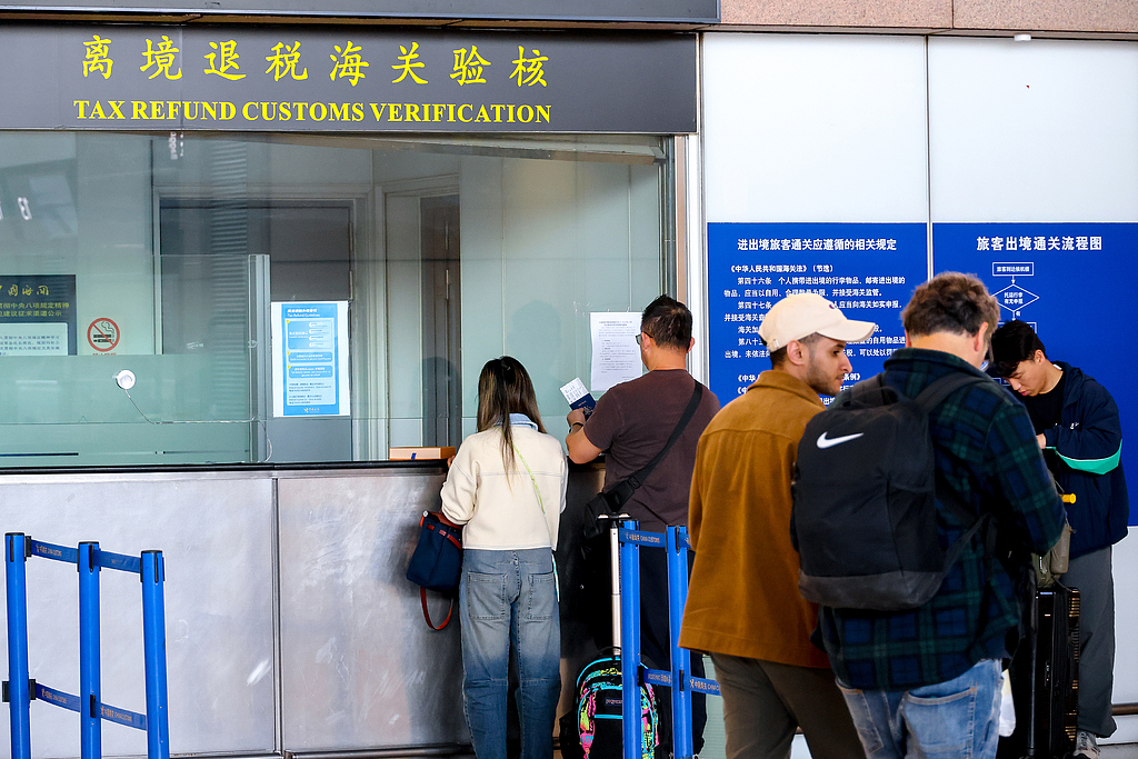 International visitors apply for tax refunds before departing from China in Shanghai on May 1, 2026. /VCG