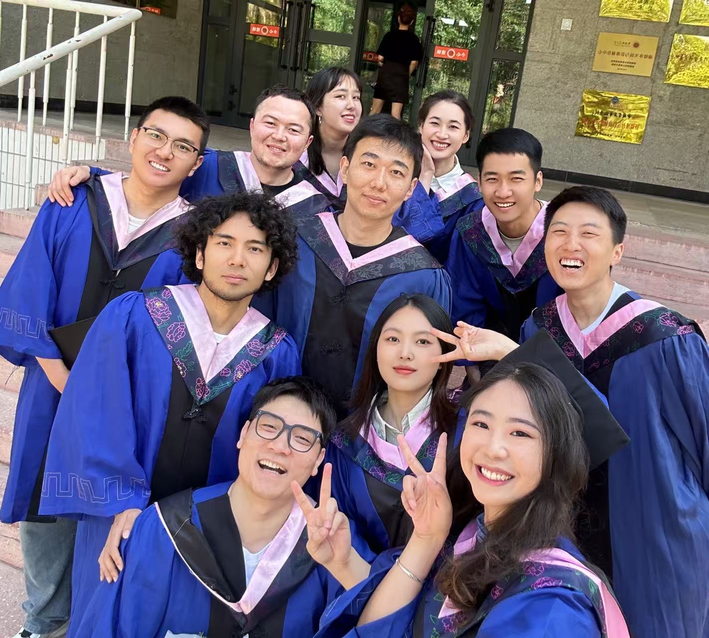 Mardan with his fellow students at their art school graduation in June 2024. /Mardan and Nurbiye