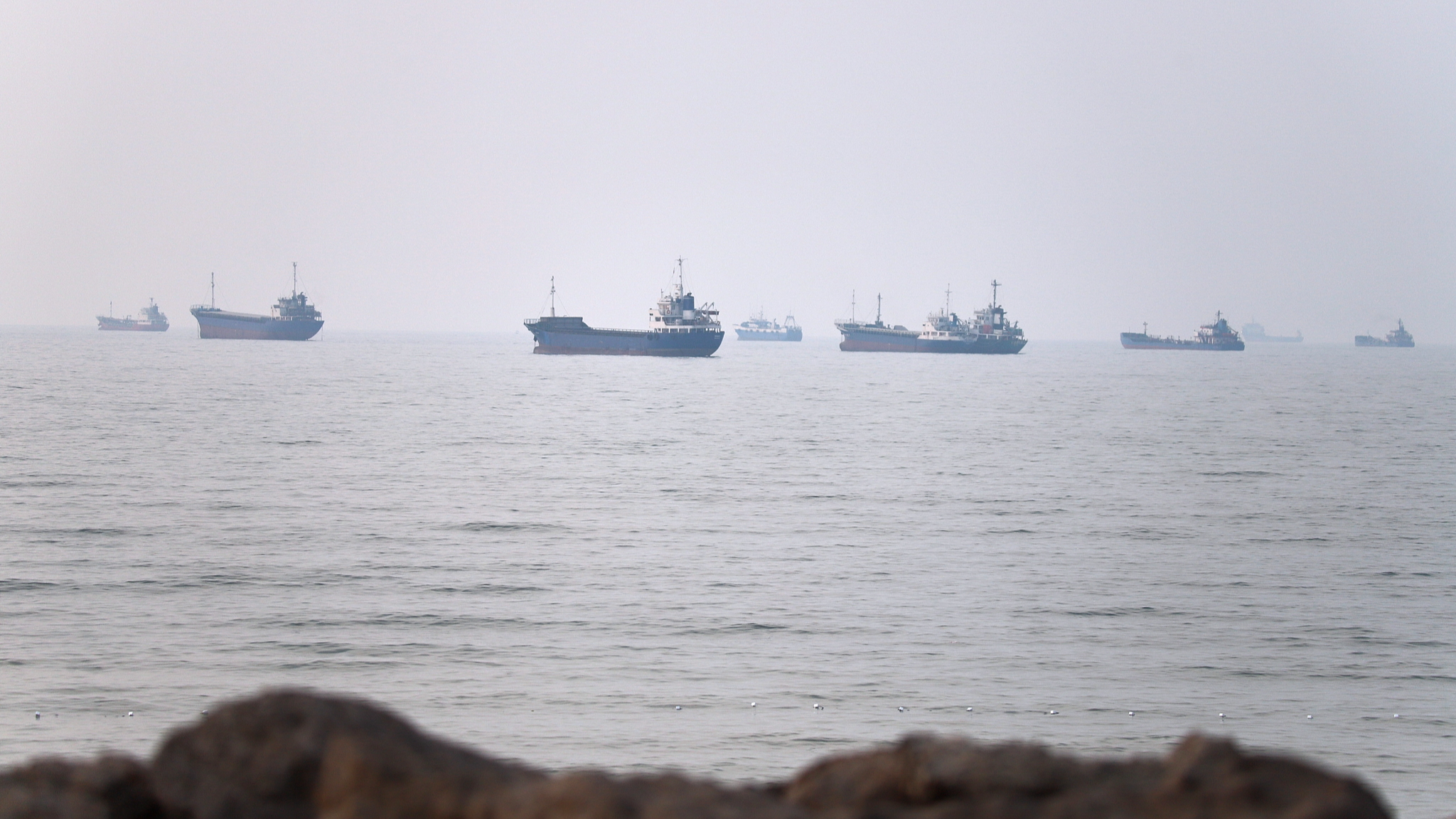 Commercial vessels are seen in the Strait of Hormuz off Bandar Abbas, Iran, June 30, 2026. /VCG