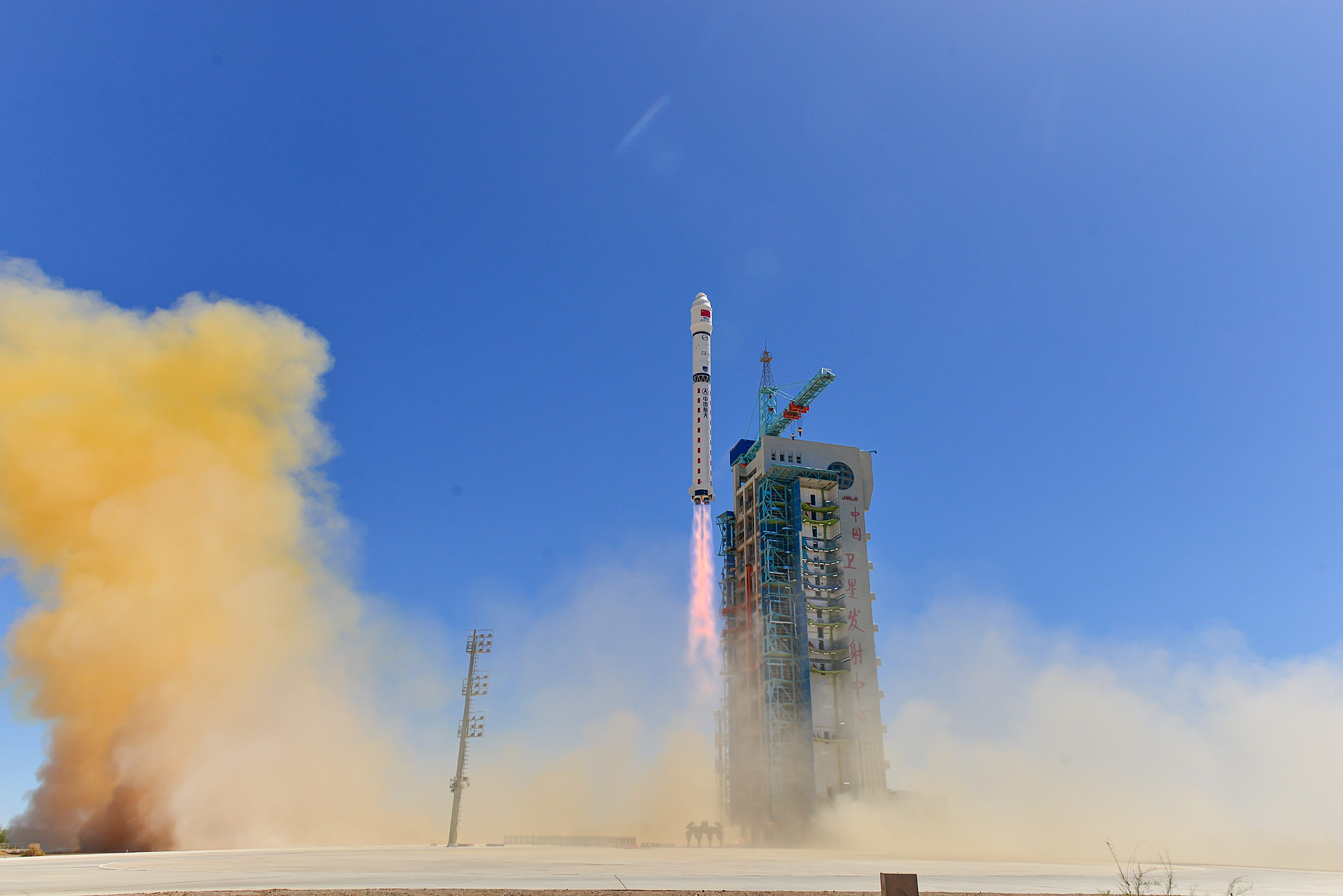 A Long March-2D rocket launches 12 satellites from the Jiuquan Satellite Launch Center, May 14, 2025. /VCG