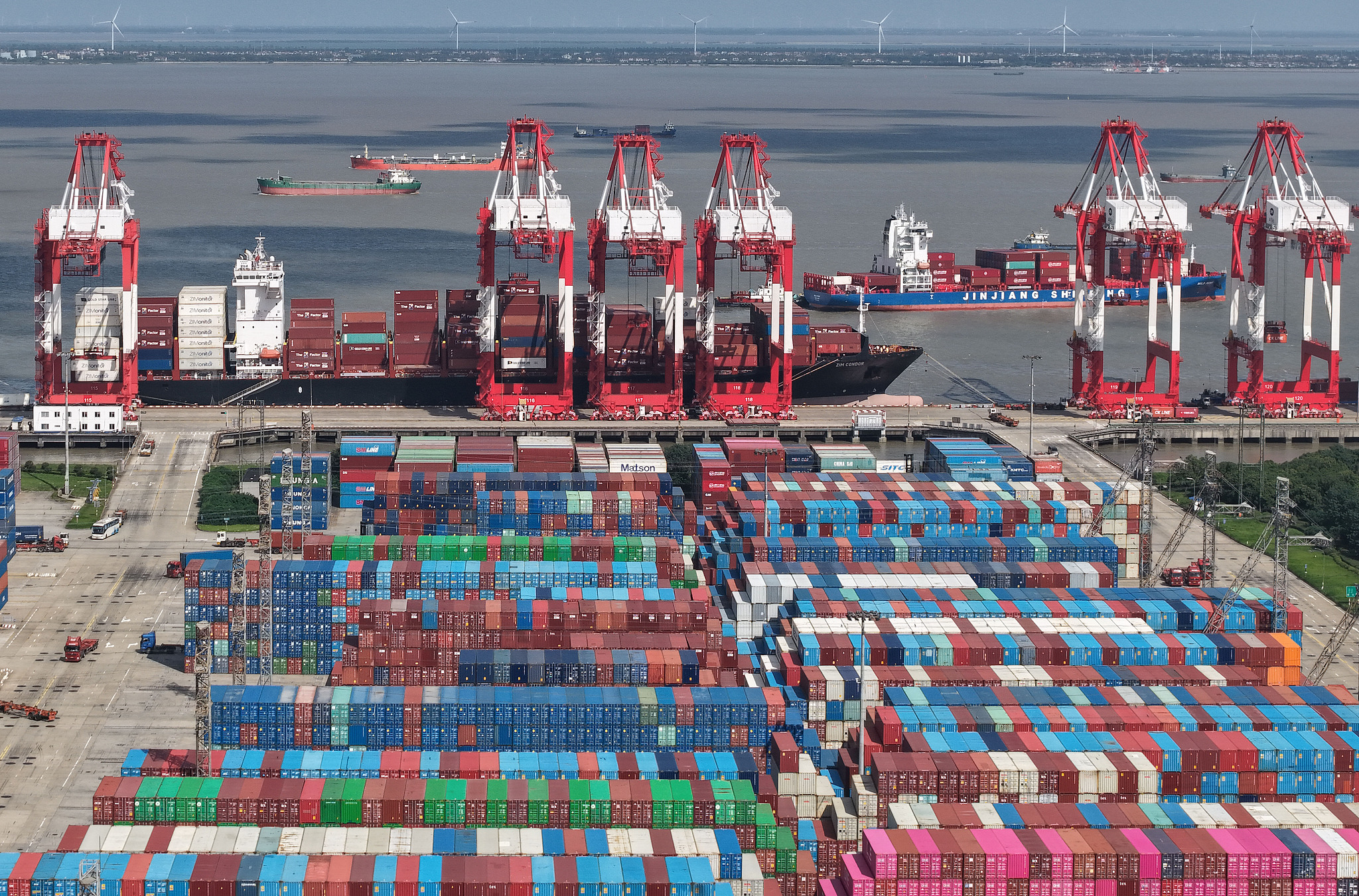 A pile of containers at a dock of Shanghai Port in Shanghai, China, June 9, 2026. /VCG