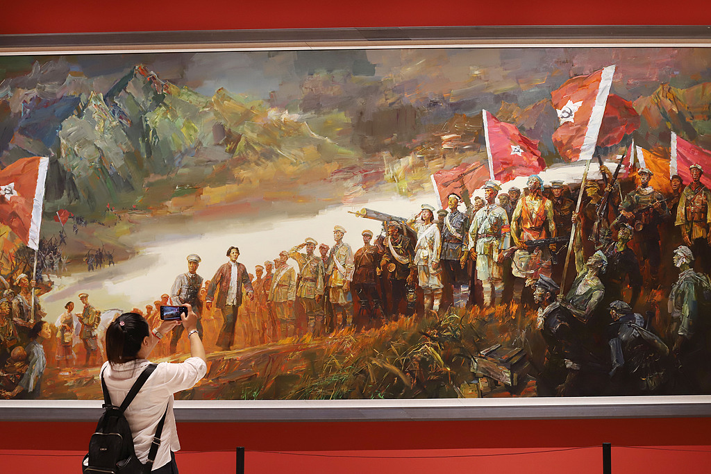 A visitor views exhibits celebrating the 105th Anniversary of the founding of the Communist Party of China in Beijing, China, July 1, 2026. /CFP