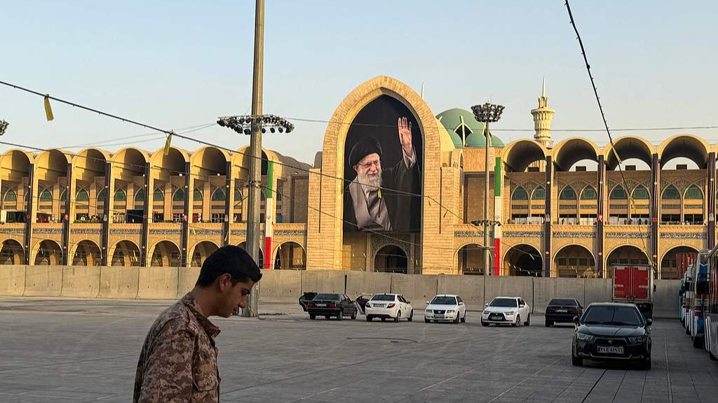 A man arrives at the Grand Mosalla ahead of Iran's late supreme leader Ali Khamenei's funeral, Tehran, Iran, July 3, 2026. /VCG