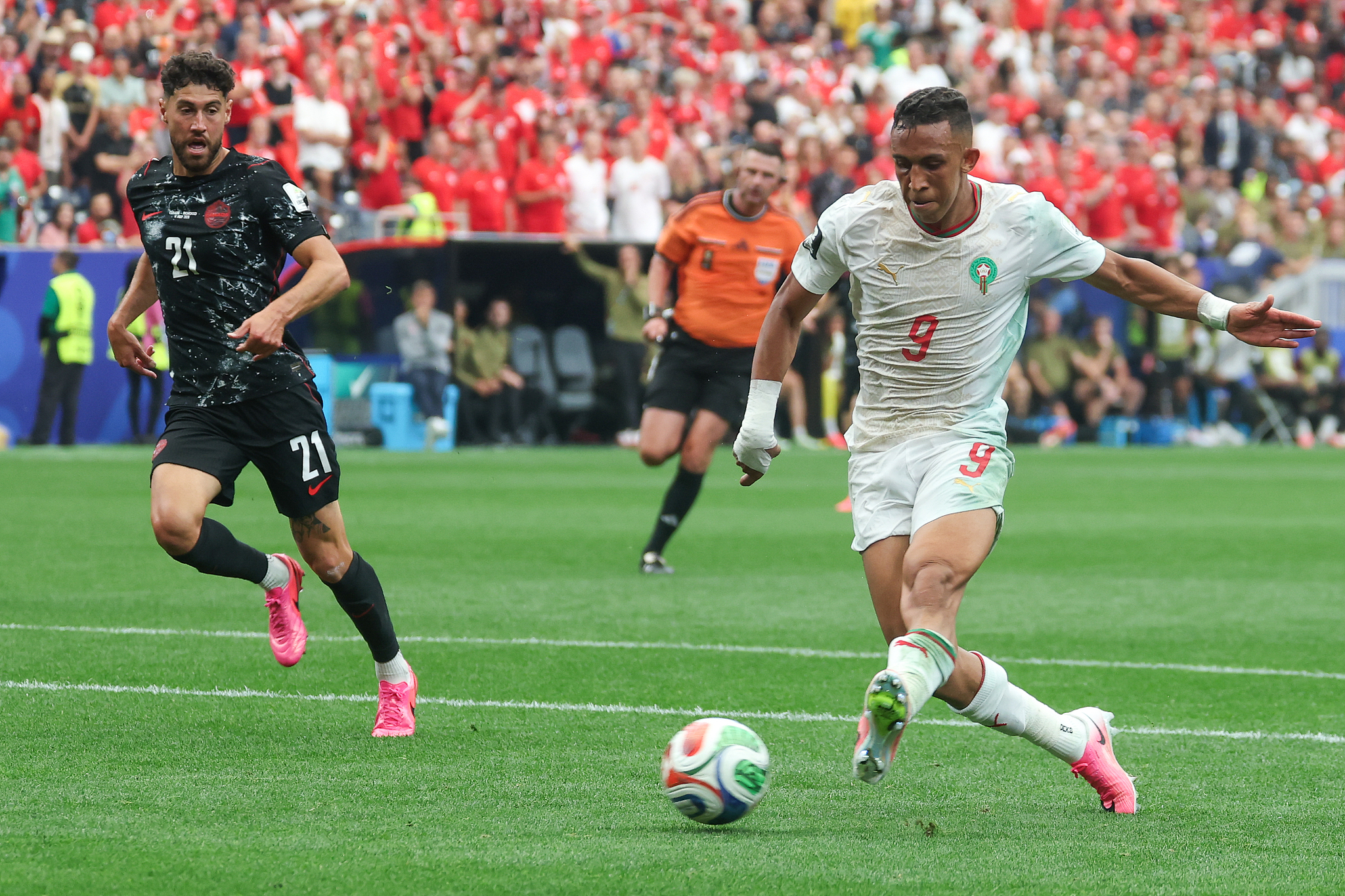Morocco striker Soufiane Rahimi (#9) shoots to score a goal in the round-of-16 match against Canada at the 2026 FIFA World Cup in Houston, Texas, July 4, 2026. /VCG
