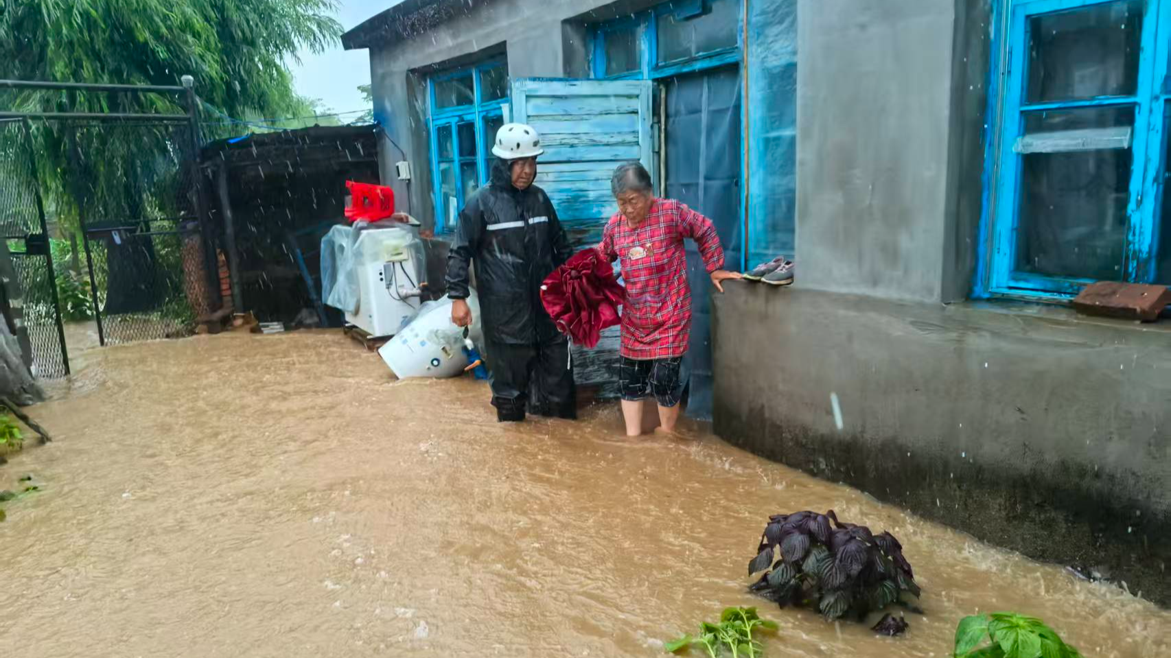 Extreme downpours battered Fushun City in northeast China's Liaoning Province in the early hours of July 4, triggering devastating flooding in urban and rural areas. /CMG 