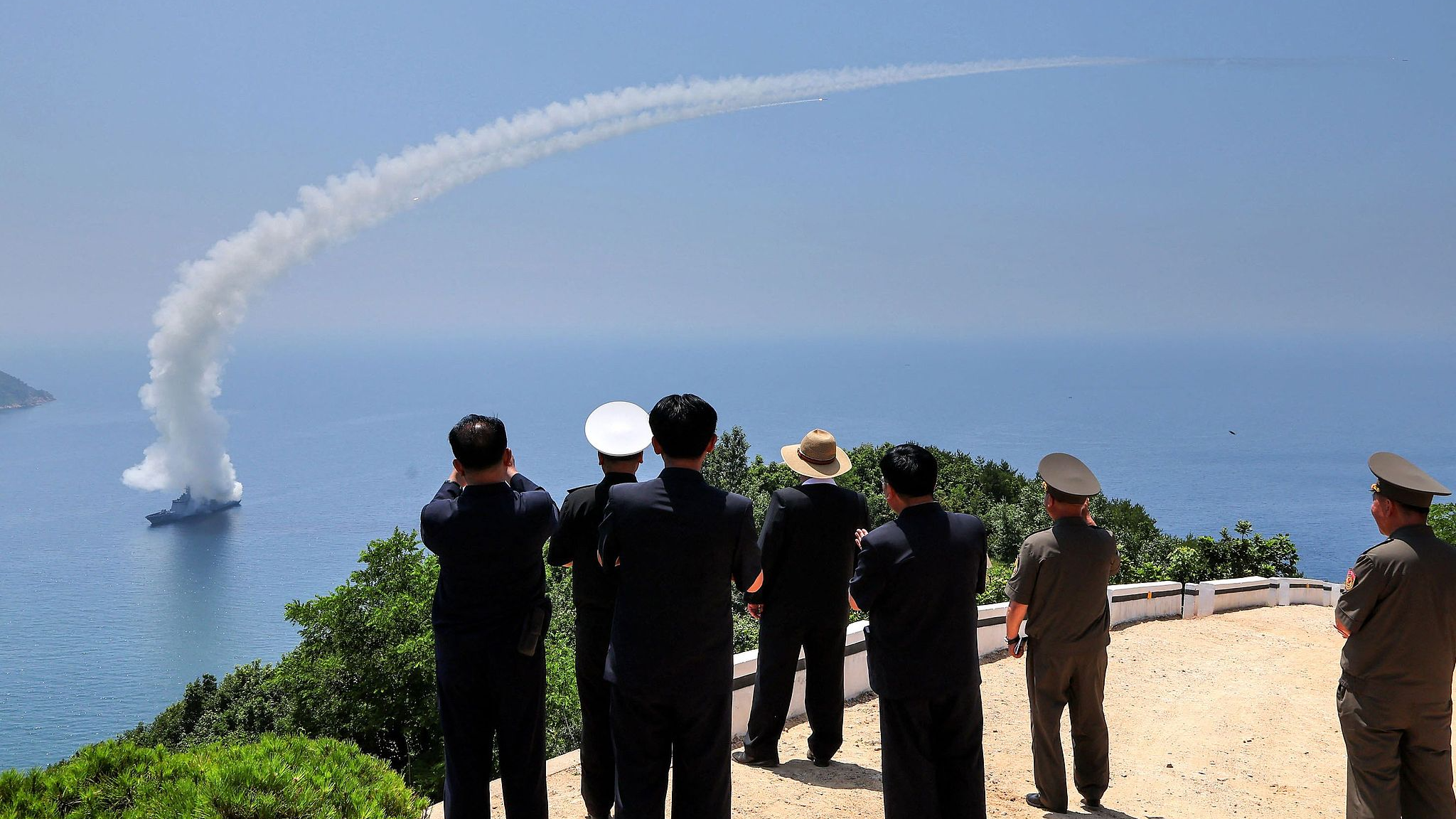 Top leader of the Democratic People's Republic of Korea (DPRK) Kim Jong Un (C) overseeing a performance test of the weapons systems of the destroyer Kang Kon at an undisclosed location in DPRK, July 3, 2026. /VCG