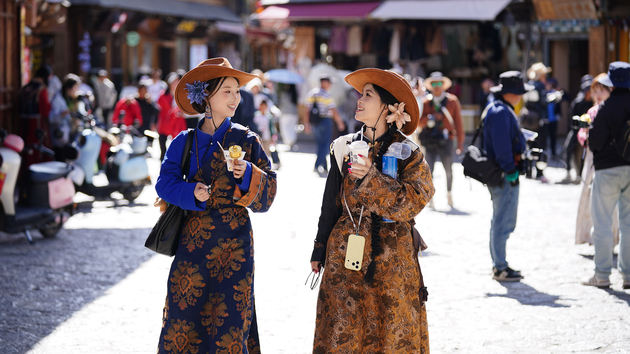 Tourists dressed in ethnic costumes visit Dukezong Ancient Town in Shangri-La, southwest China's Yunnan Province, May 16, 2026. /VCG