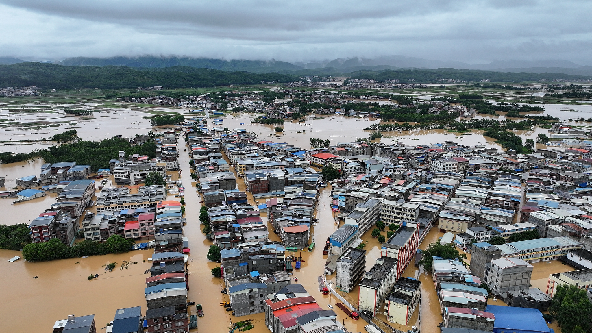 Floodwaters inundate Pingshan Village in Xiaoyi Town, Hengzhou City, south China's Guangxi Zhuang Autonomous Region, under the impact of Typhoon Maysak, July 6, 2026. /VCG