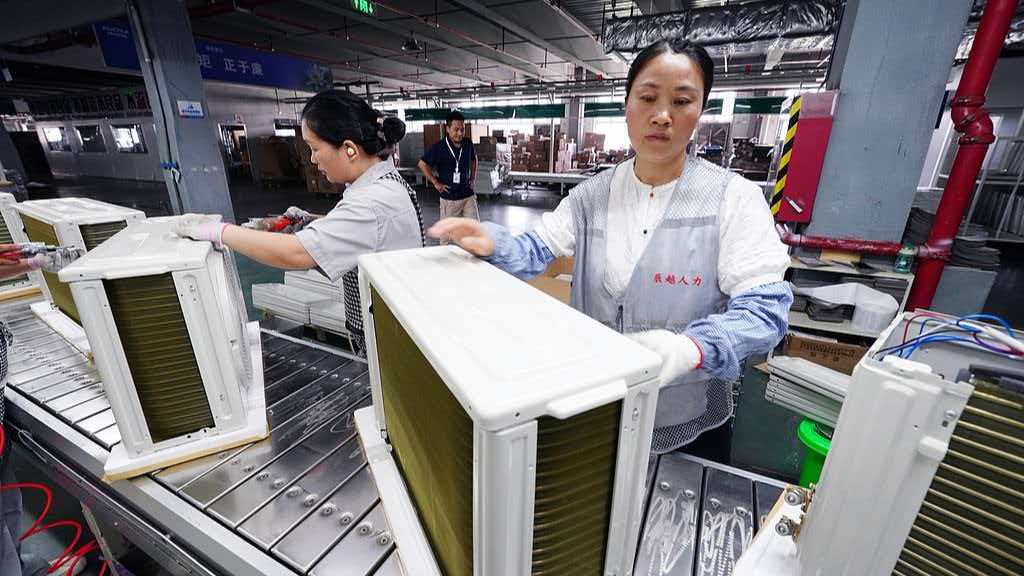 Staff at an air conditioner production line in Fuyang, east China's Anhui Province, June 4, 2026. /VCG