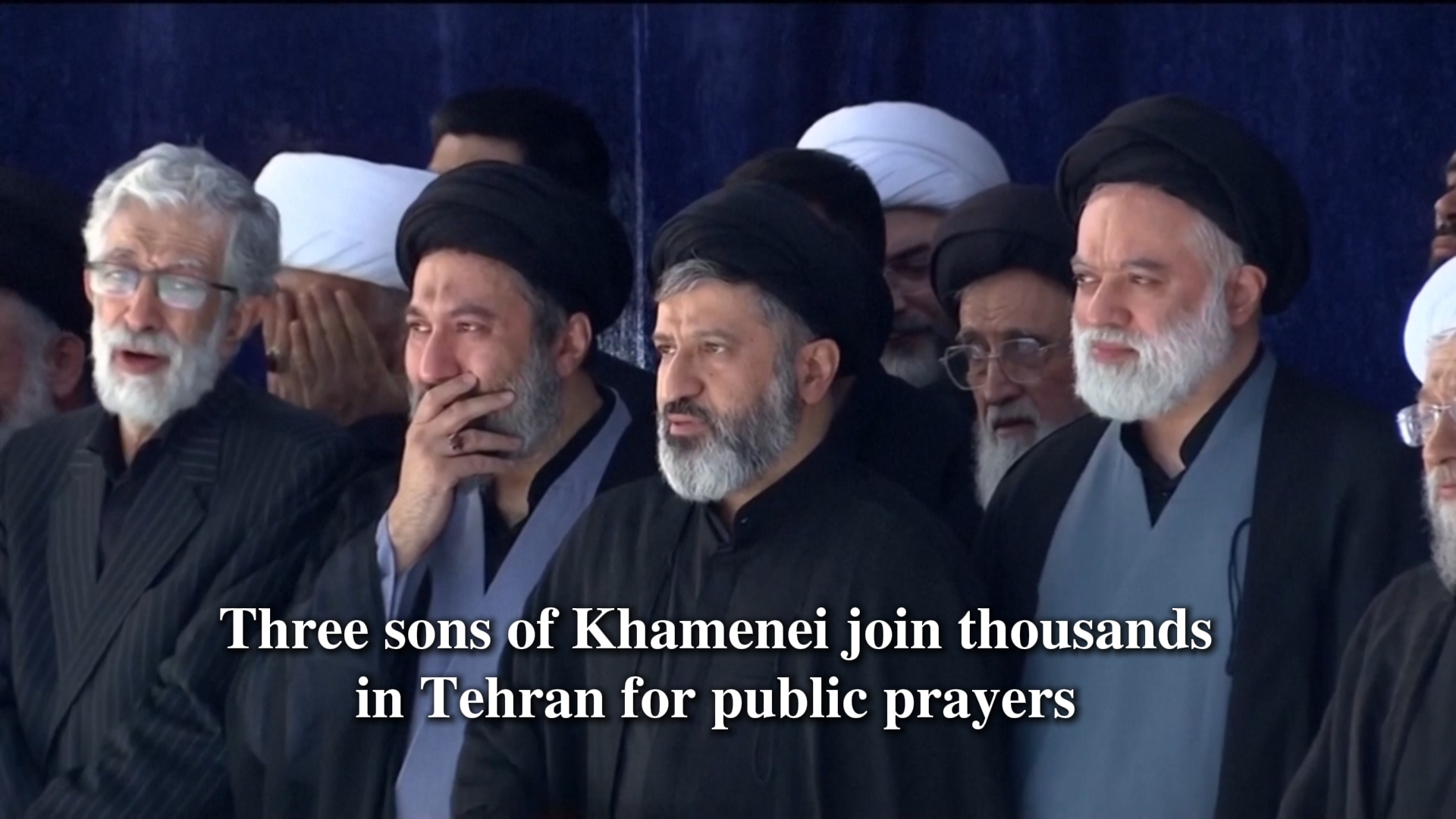 Three sons of Ali Khamenei join thousands in Tehran for public prayers