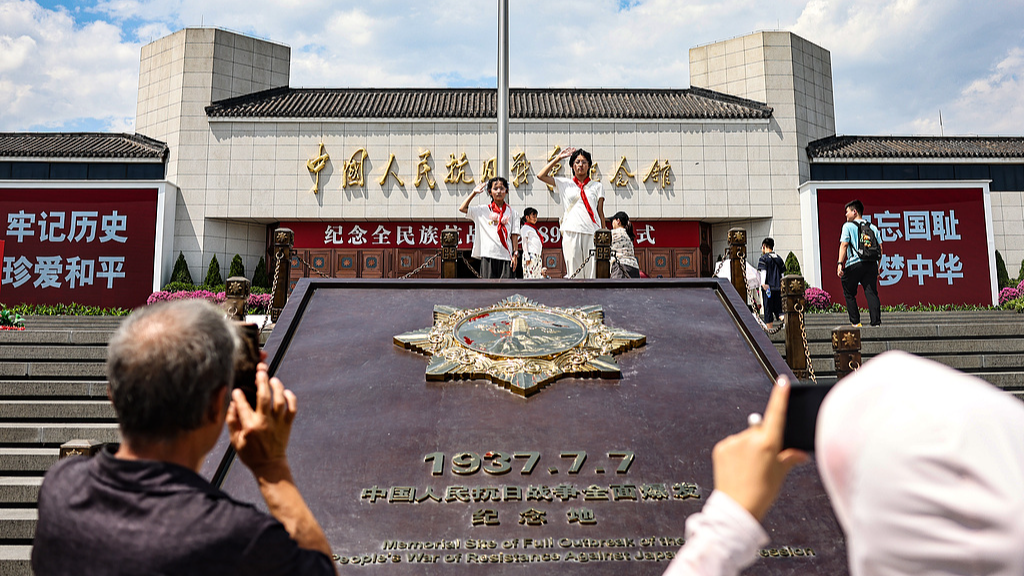 People visit the Museum of the Chinese People's War of Resistance Against Japanese Aggression in Beijing, China, July 7, 2026. /VCG