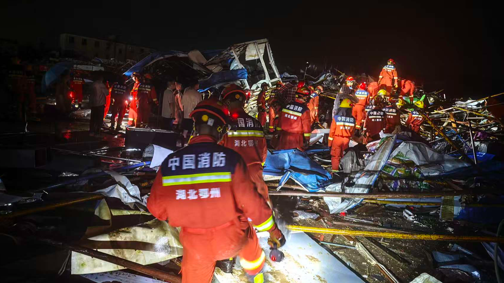 Firefighters carry out rescue operations after a tornado hit Huanggang, Hubei Province, China, July 7, 2026. /VCG