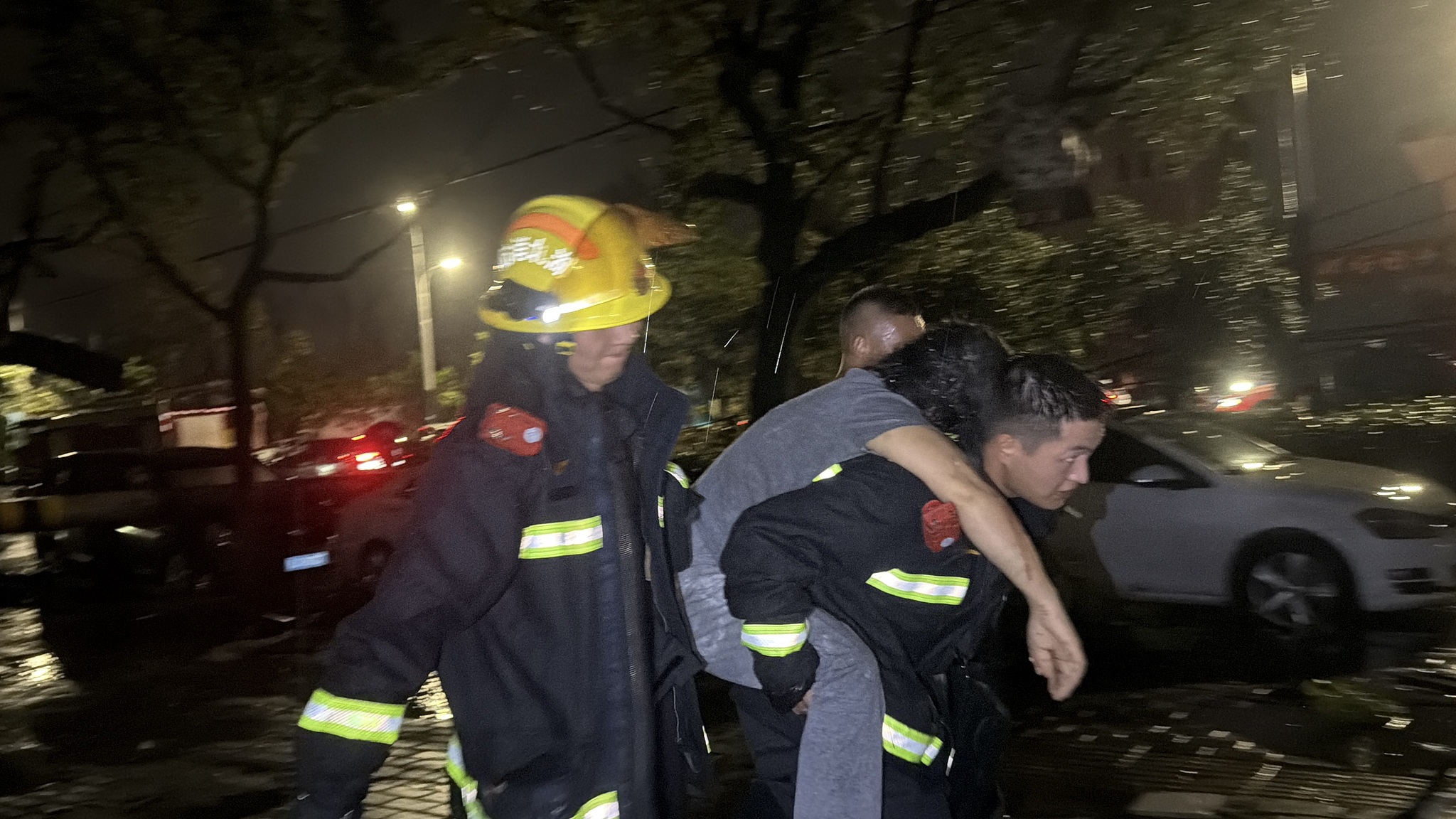 Firefighters evacuate stranded residents after a tornado struck Huanggang, Hubei Province, China, July 7, 2026. /VCG