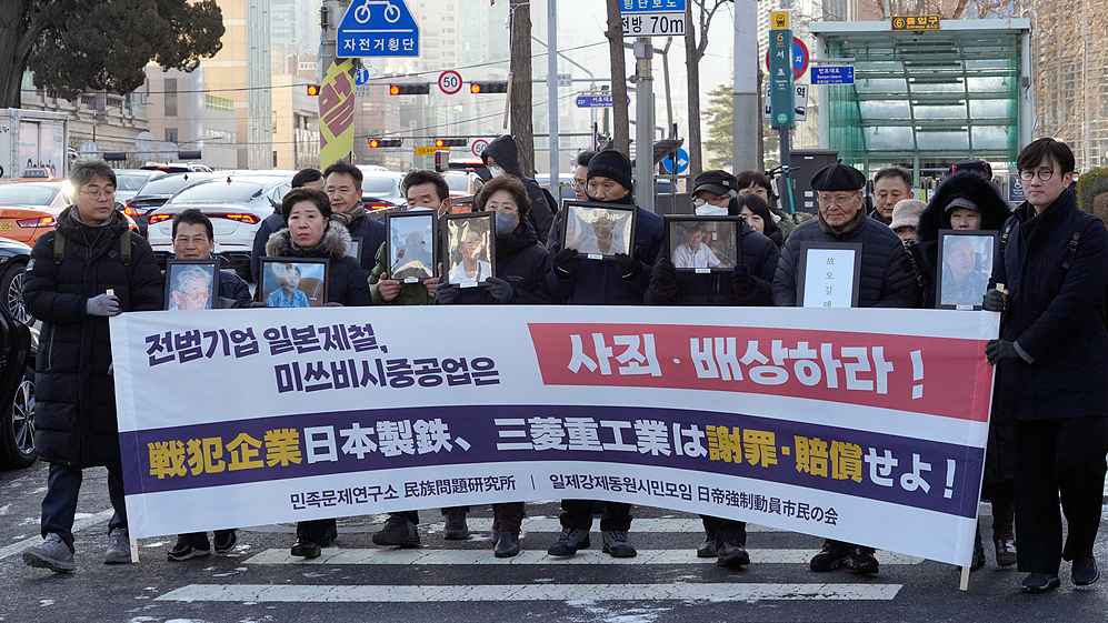Japan's war victim aid bill renews WWII reparations debate