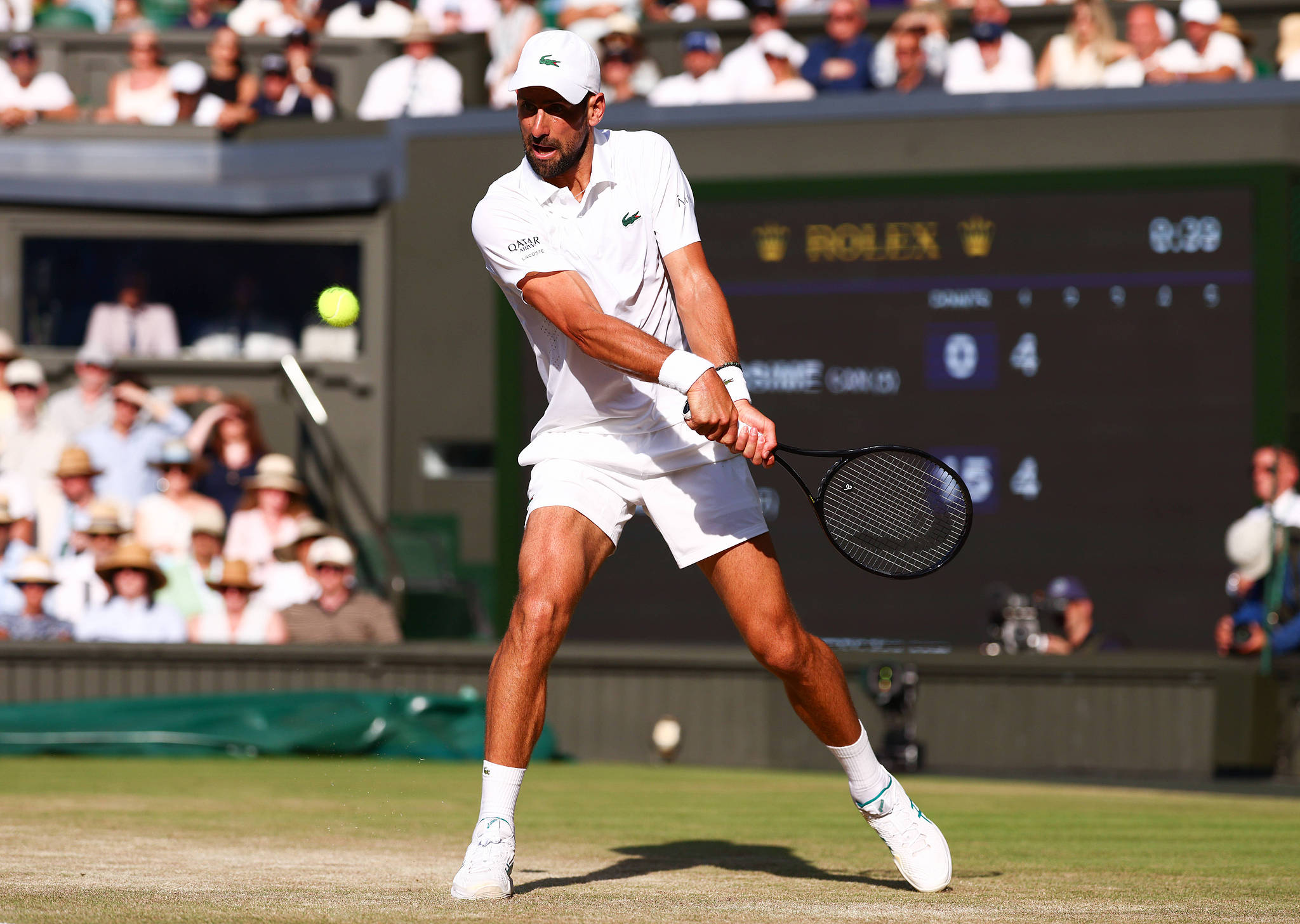 Serbia's Novak Djokovic hits a shot against Canada's Felix Auger-Aliassime in a men's singles quarterfinal match at the Wimbledon Championships at the All England Lawn Tennis and Croquet Club in London, England, UK, July 7, 2026. /VCG