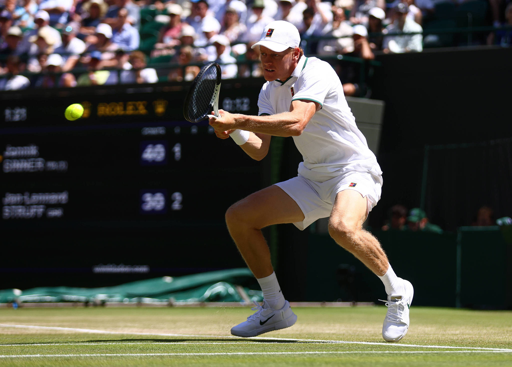 Italy's Jannik Sinner hits a shot against Germany's Jan-Lennard Struff in a men's singles quarterfinal match at the Wimbledon Championships at the All England Lawn Tennis and Croquet Club in London, England, UK, July 7, 2026. /VCG